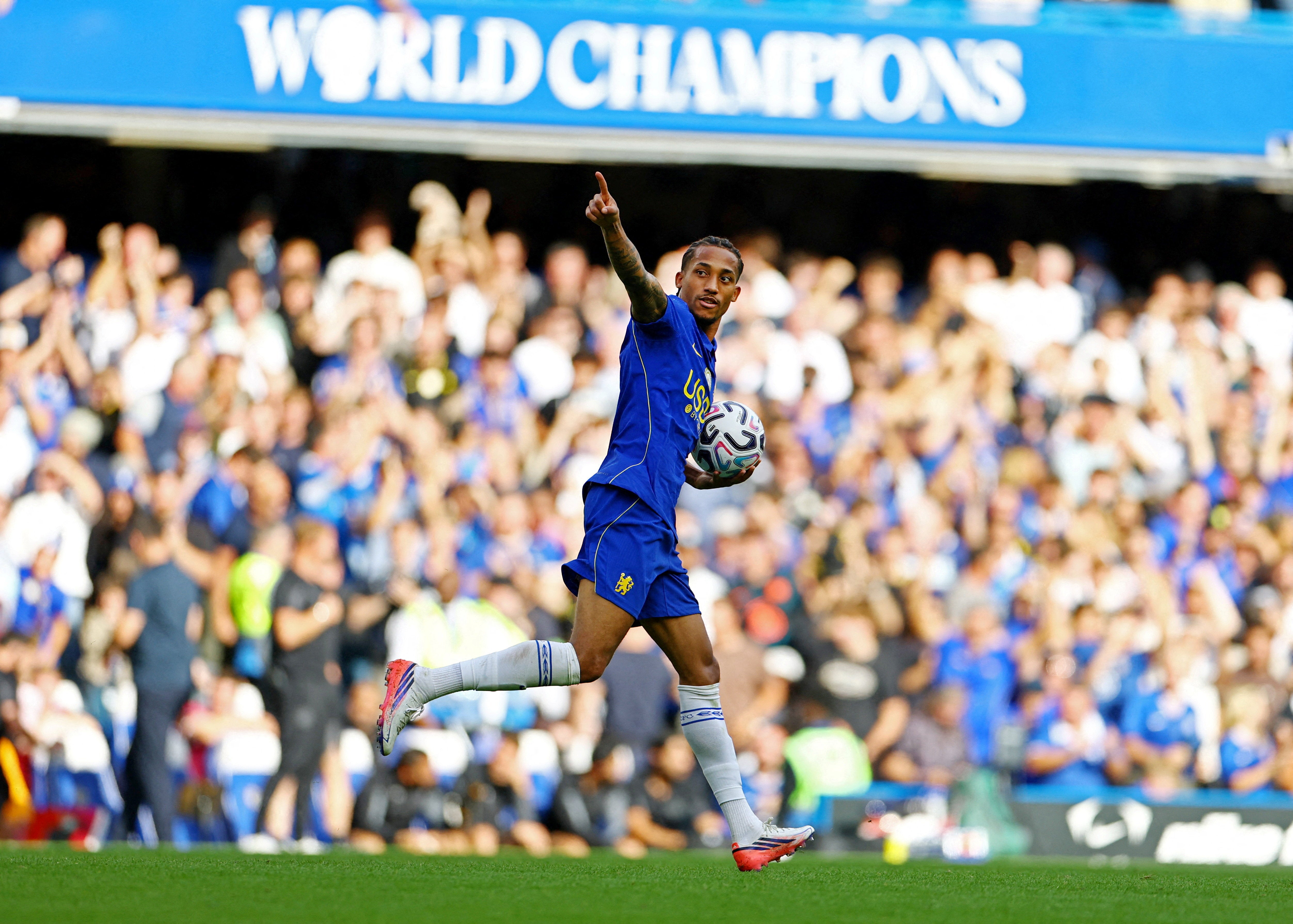 Joao Pedro celebrates after levelling for Chelsea in the second half