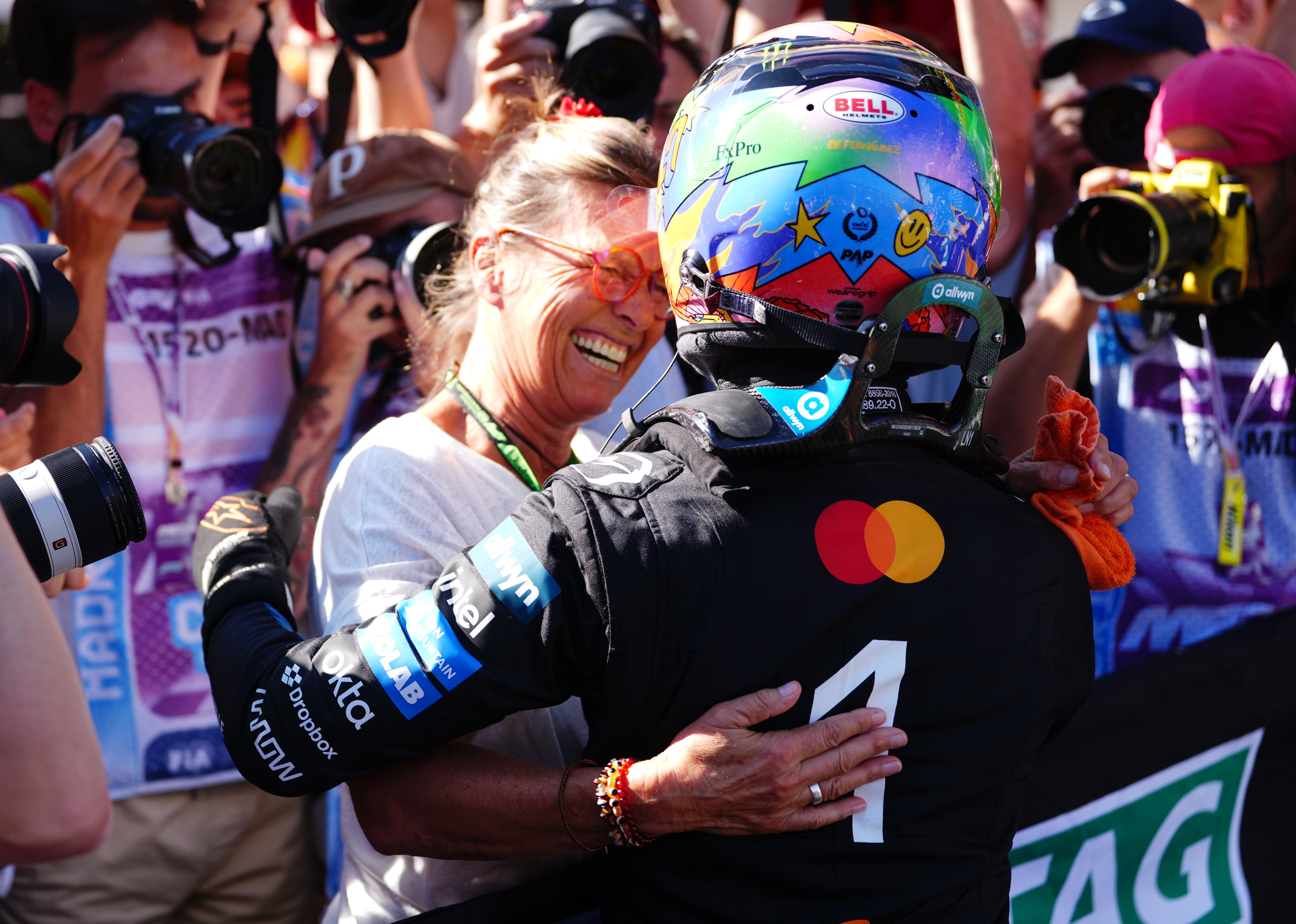 Norris celebrate his pole lap with his mother, Cisca in Madrid (David Davies/PA)