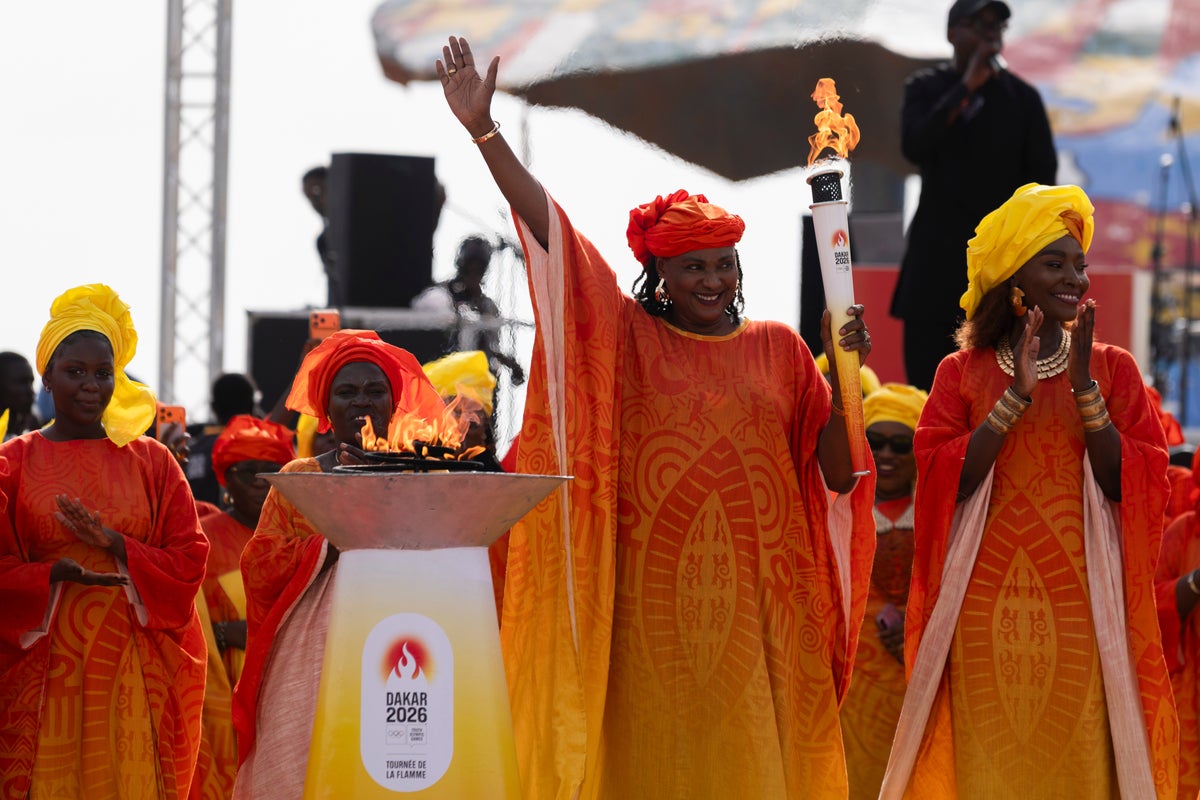 Olympic flame arrives in Senegal for the first Olympic event to be held in Africa