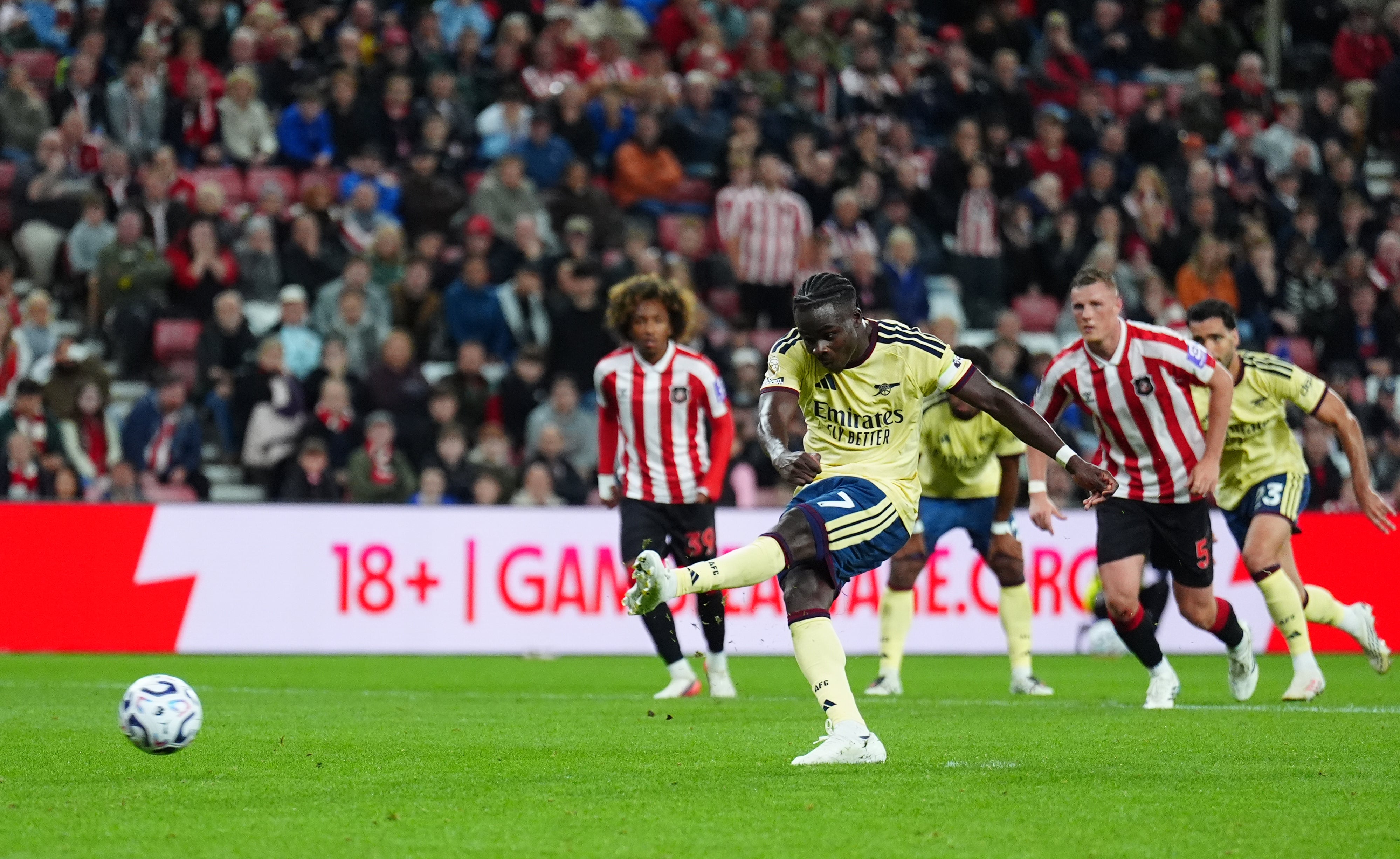 Bukayo Saka sealed the points from the penalty spot in added time (Owen Humphreys/PA)