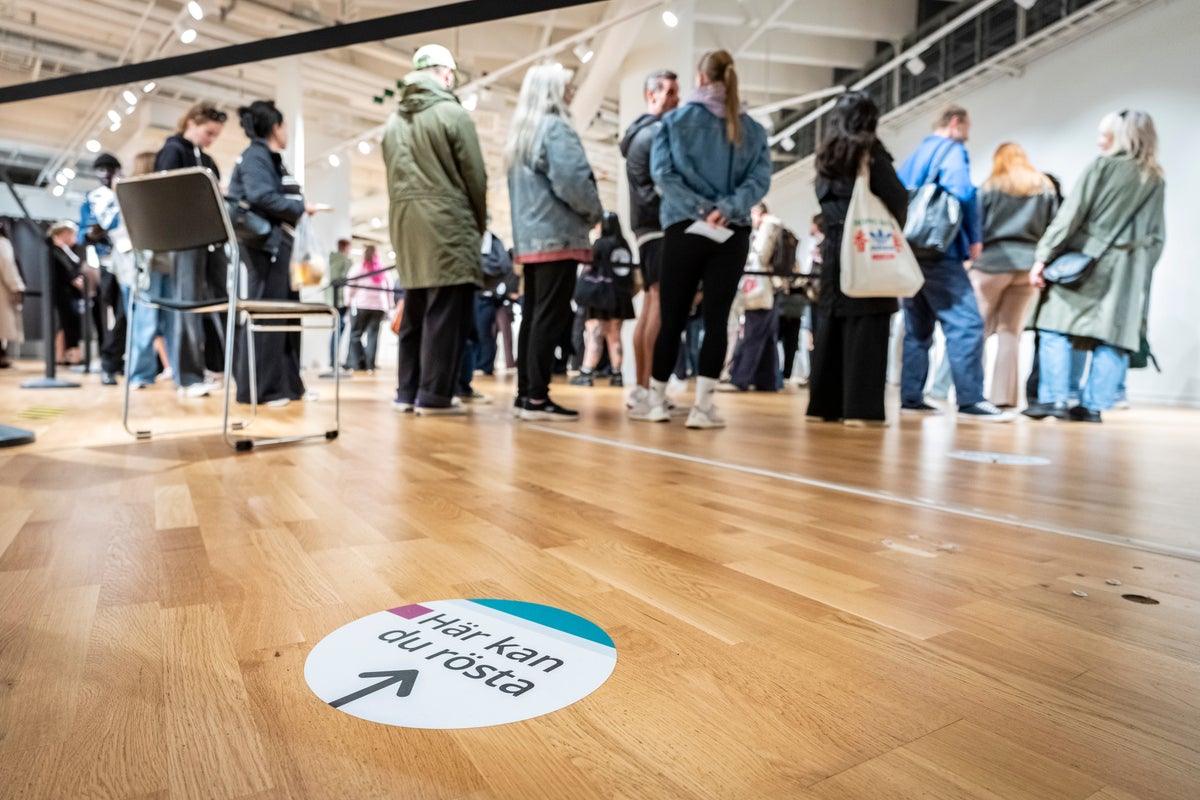 Swedish voters go to polls to choose a new parliament as hard right bids for role in government