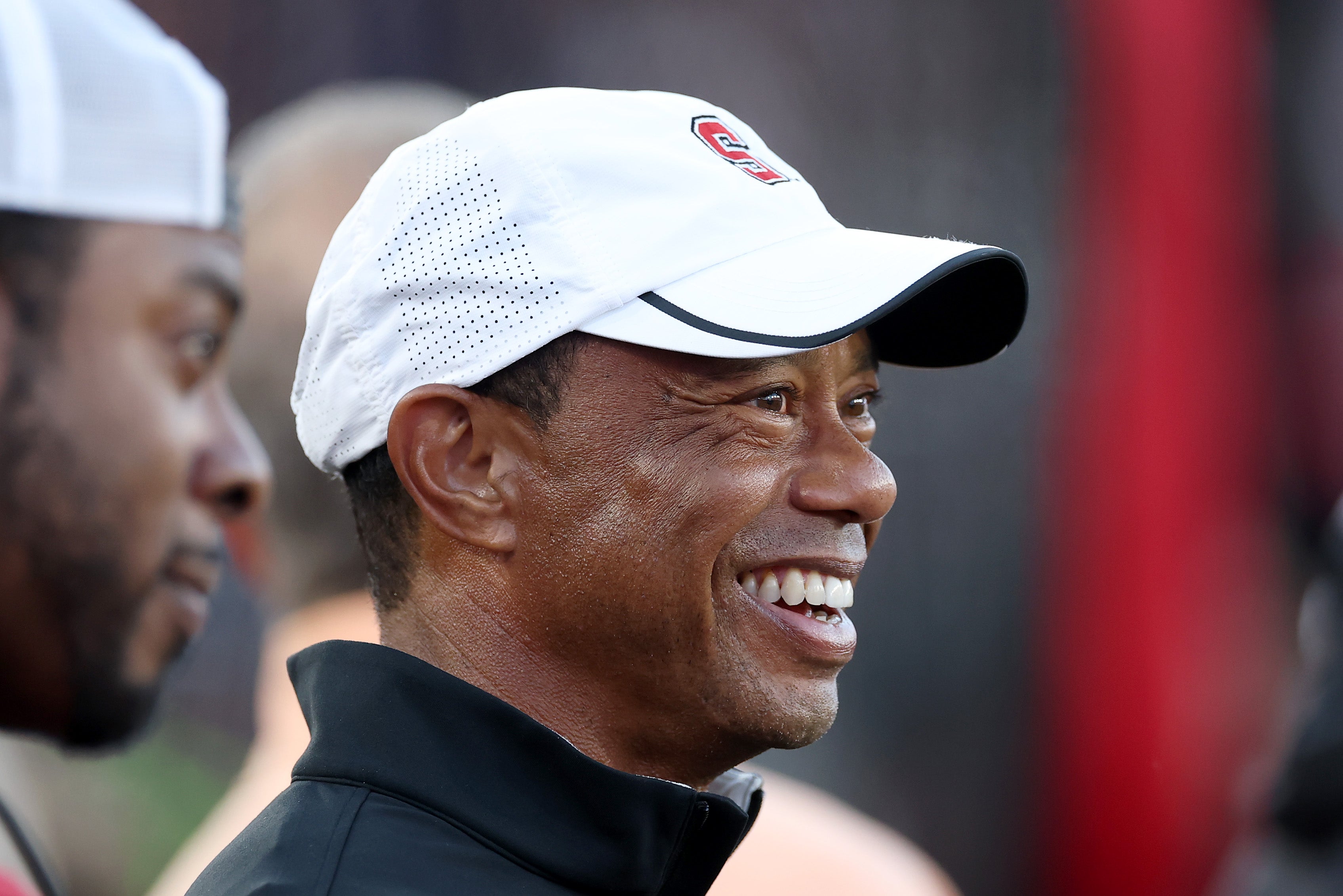 Professional golfer and Stanford Cardinal alumni Tiger Woods stands on the sidelines during the first half of the Stanford Cardinal game against the Miami (FL) Hurricanes at Stanford Stadium on September 04, 2026 in Stanford, California (Getty)