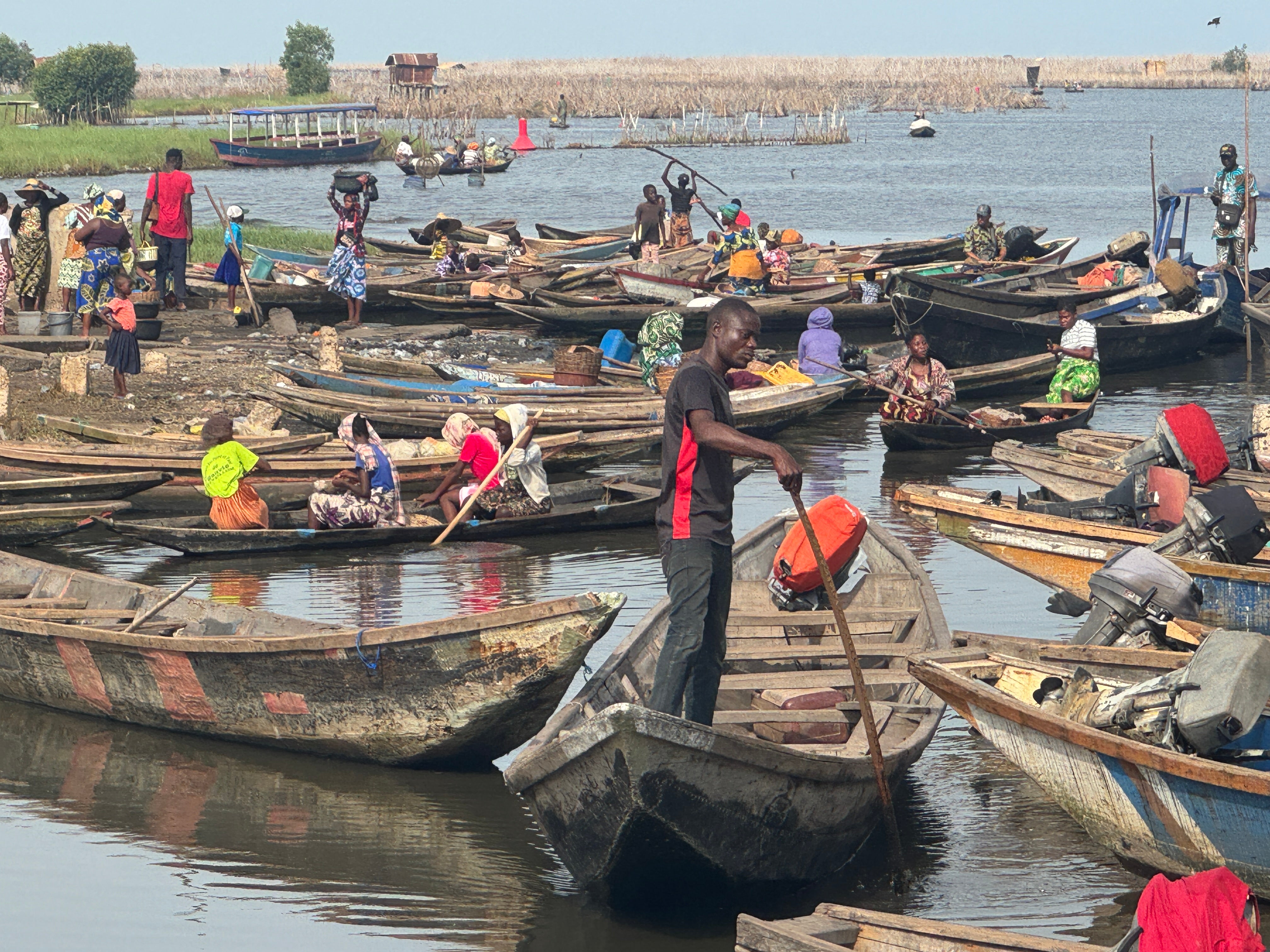 In the lake village of Ganvie preparing to ferry commuters to the mainland back home