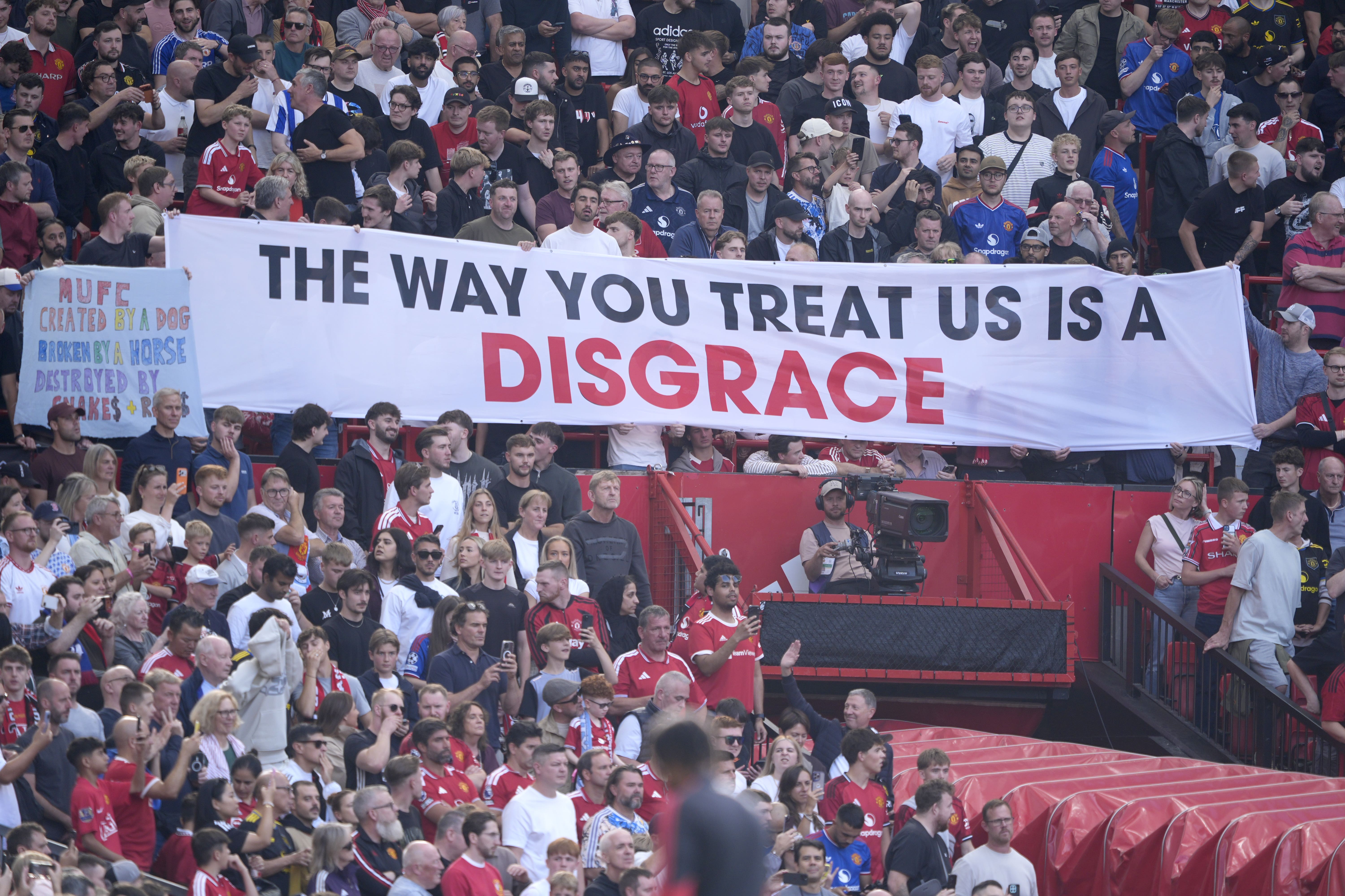 United fans displayed a banner in protest in the stands ahead of the Manchester derby in September