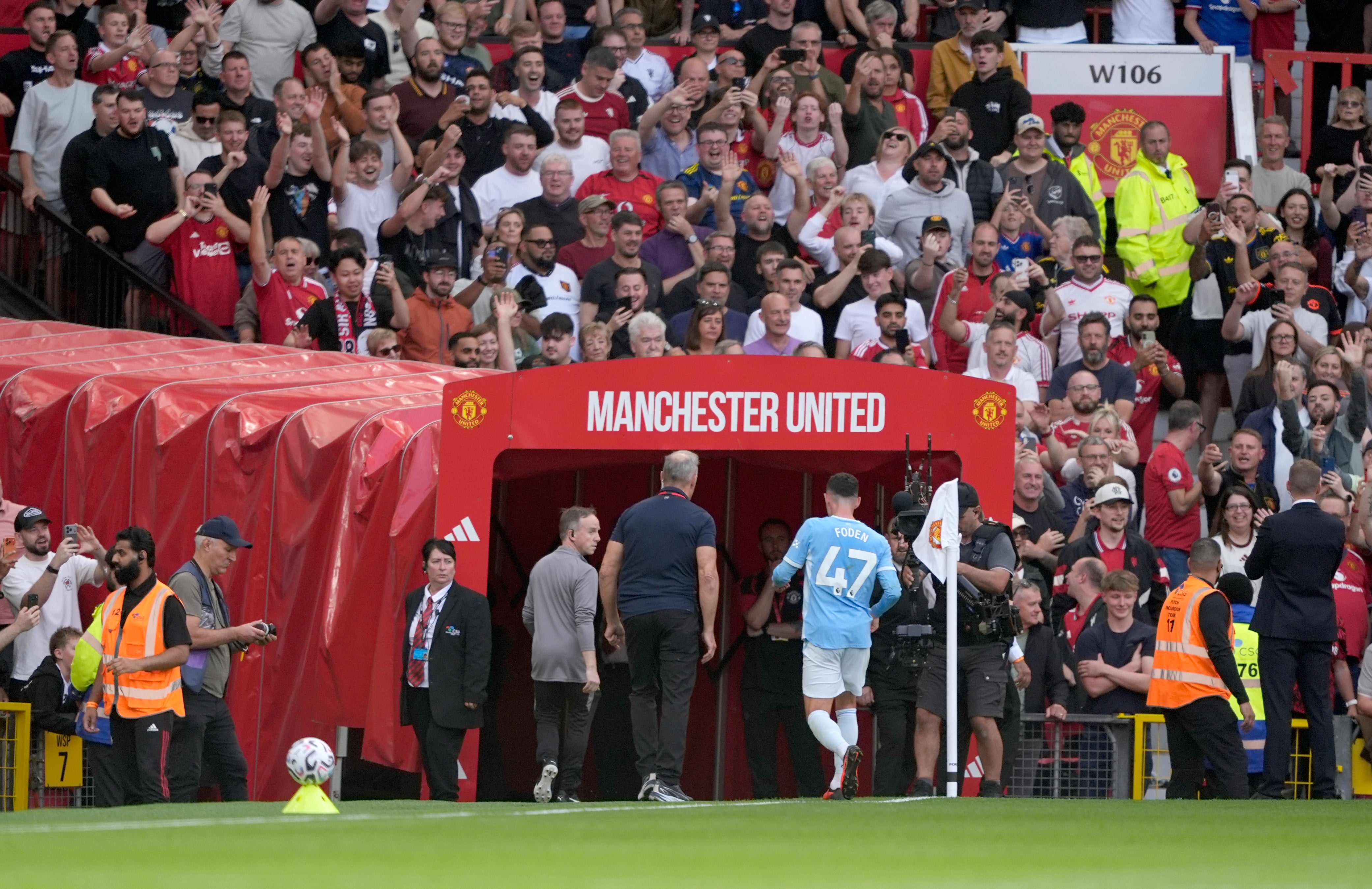 Foden runs down the tunnel after being shown a red card