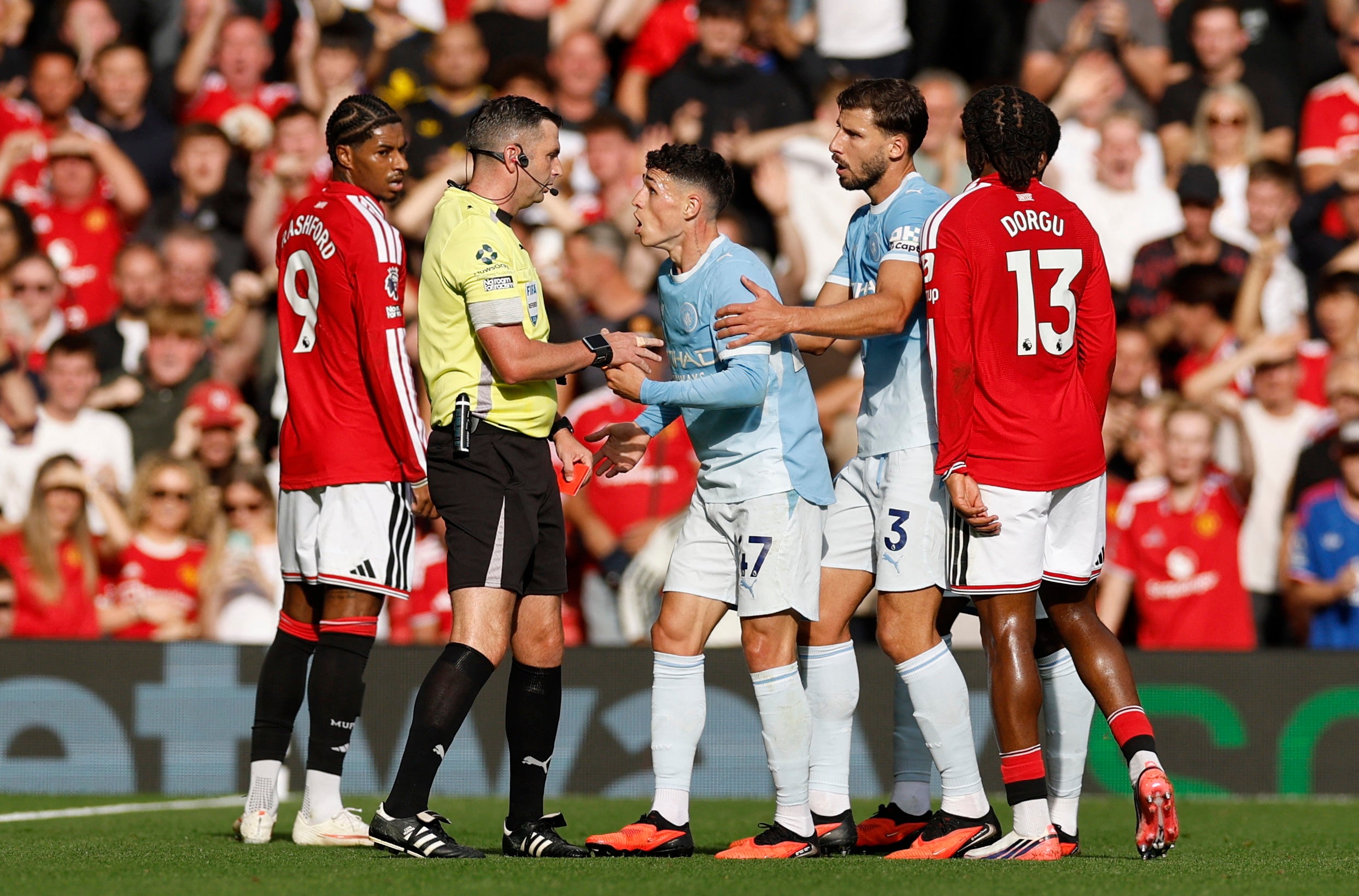 Foden remonstrates with referee Michael Oliver