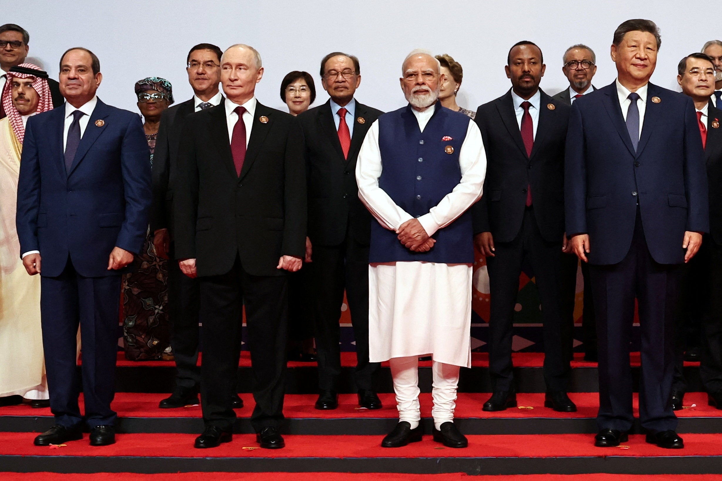 Egyptian President Abdel FattEgyptian President Abdel Fattah al-Sisi, Russian President Vladimir Putin, Indian Prime Minister Narendra Modi and Chinese President Xi Jinping pose for a family photo on day two of the BRICS Summit in New Delhi, Indiaah al-Sisi, Russian President Vladimir Putin, Indian Prime Minister Narendra Modi and Chinese President Xi Jinping pose for a family photo on day two of the BRICS Summit in New Delhi, India (Reuters)