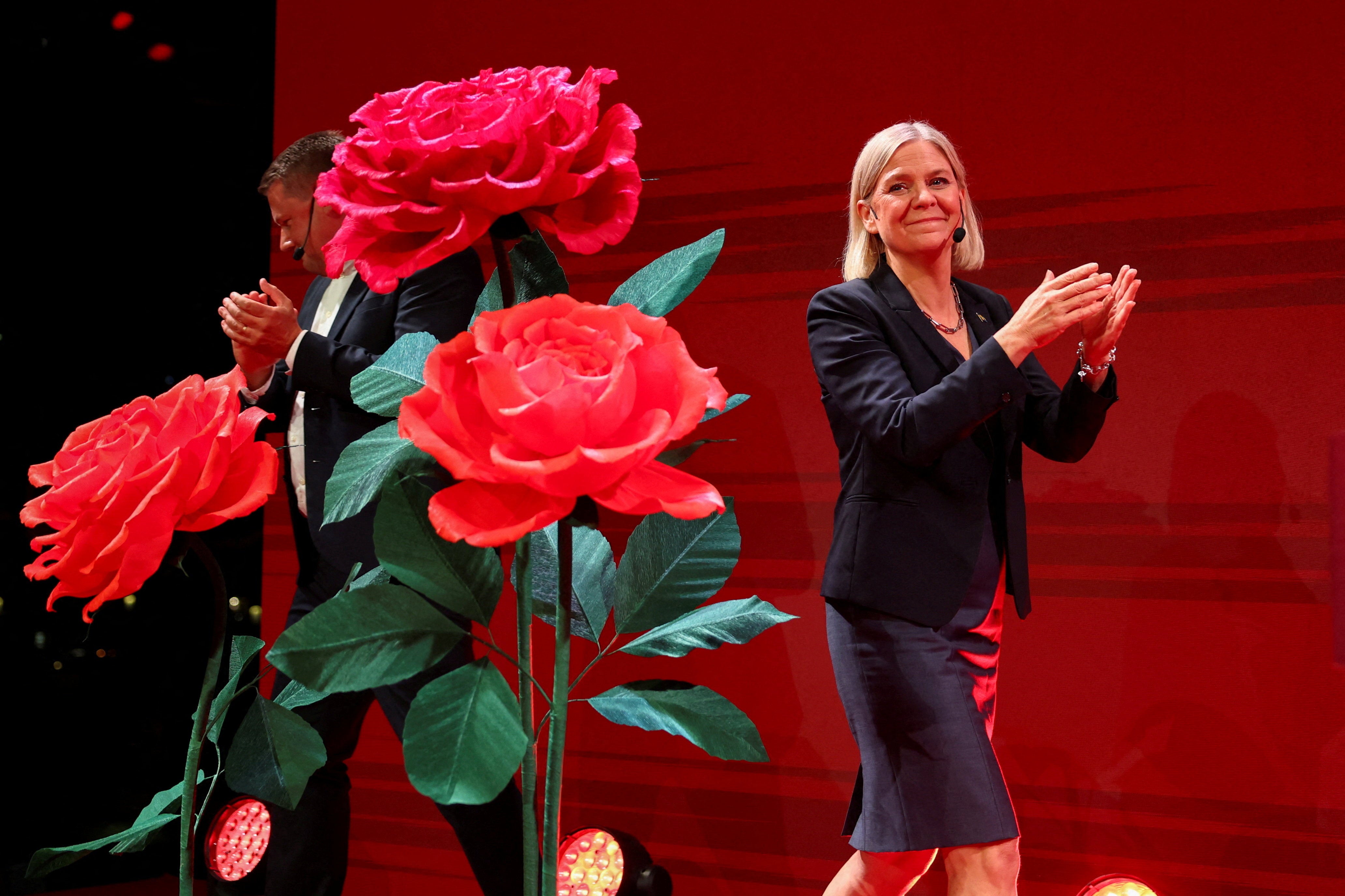 Swedish Social Democratic Party Magdalena Andersson claps on stage as the general election's voting results are released in Stockholm, Sweden