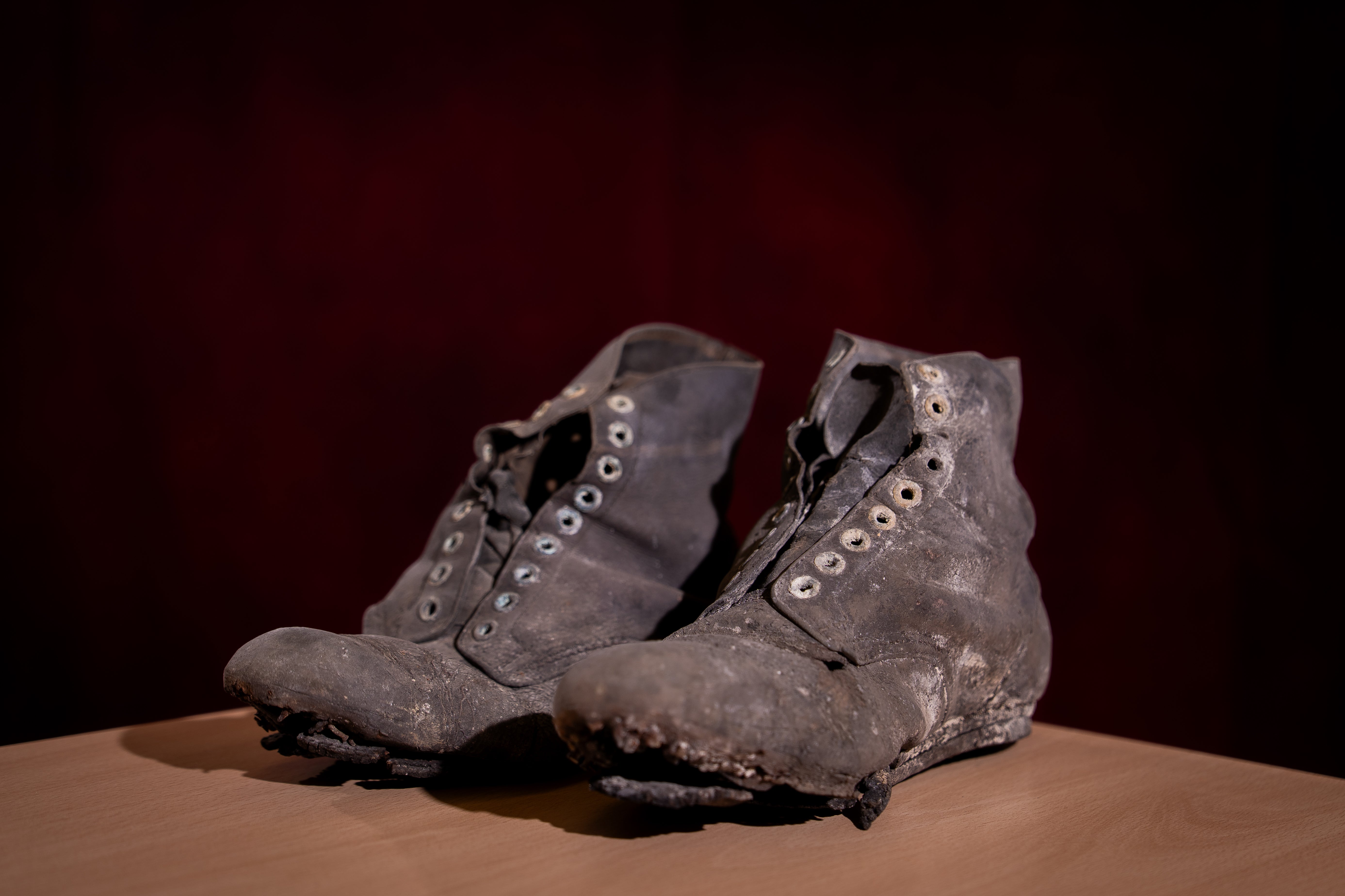 A pair of Hobnail boots, one of the everyday items which have been found beneath the floorboards and hidden within Buckingham Palace