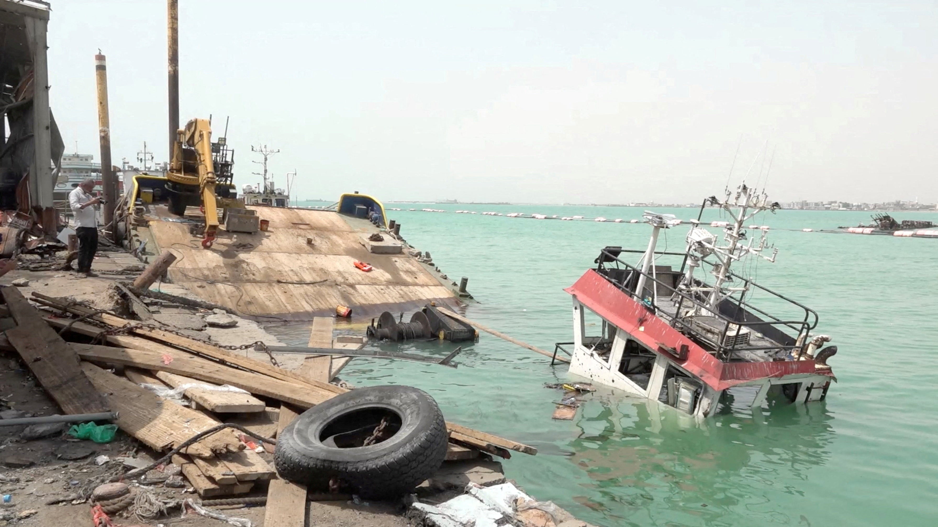 Damage in the aftermath of Houthi strikes on the Red Sea port city of Mocha, on 10 August