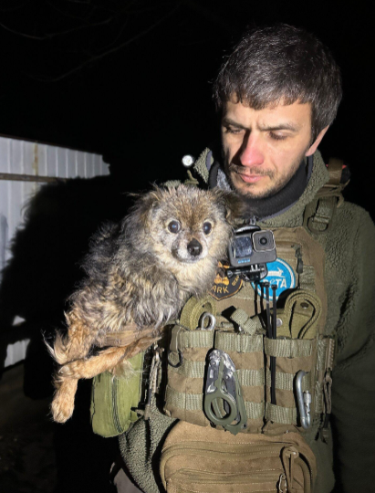 Ruslan Horbal, 43, with a rescued animal in Ukraine's Kharkiv region