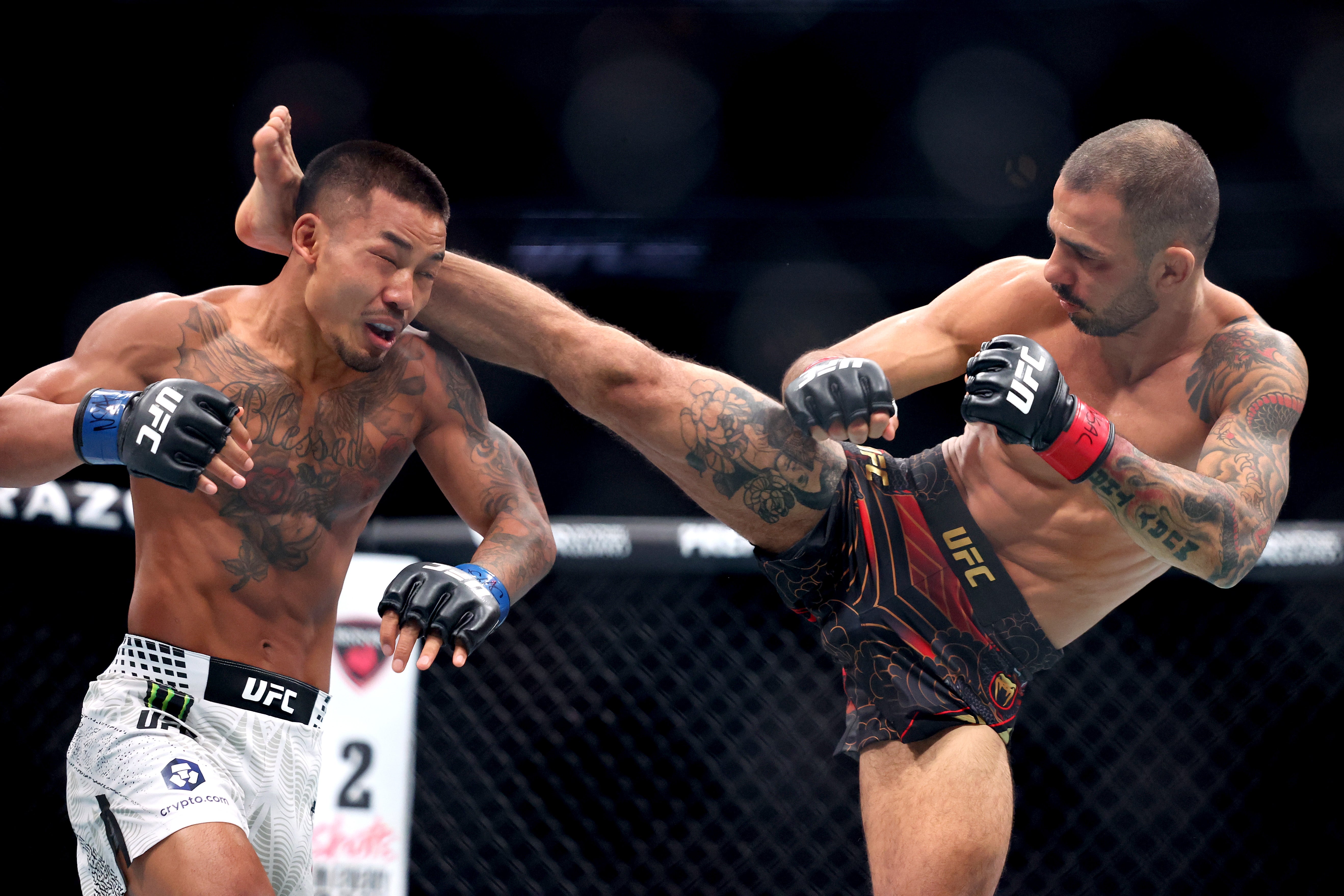 Alexandre Pantoja (right) and Joshua Van during their first fight