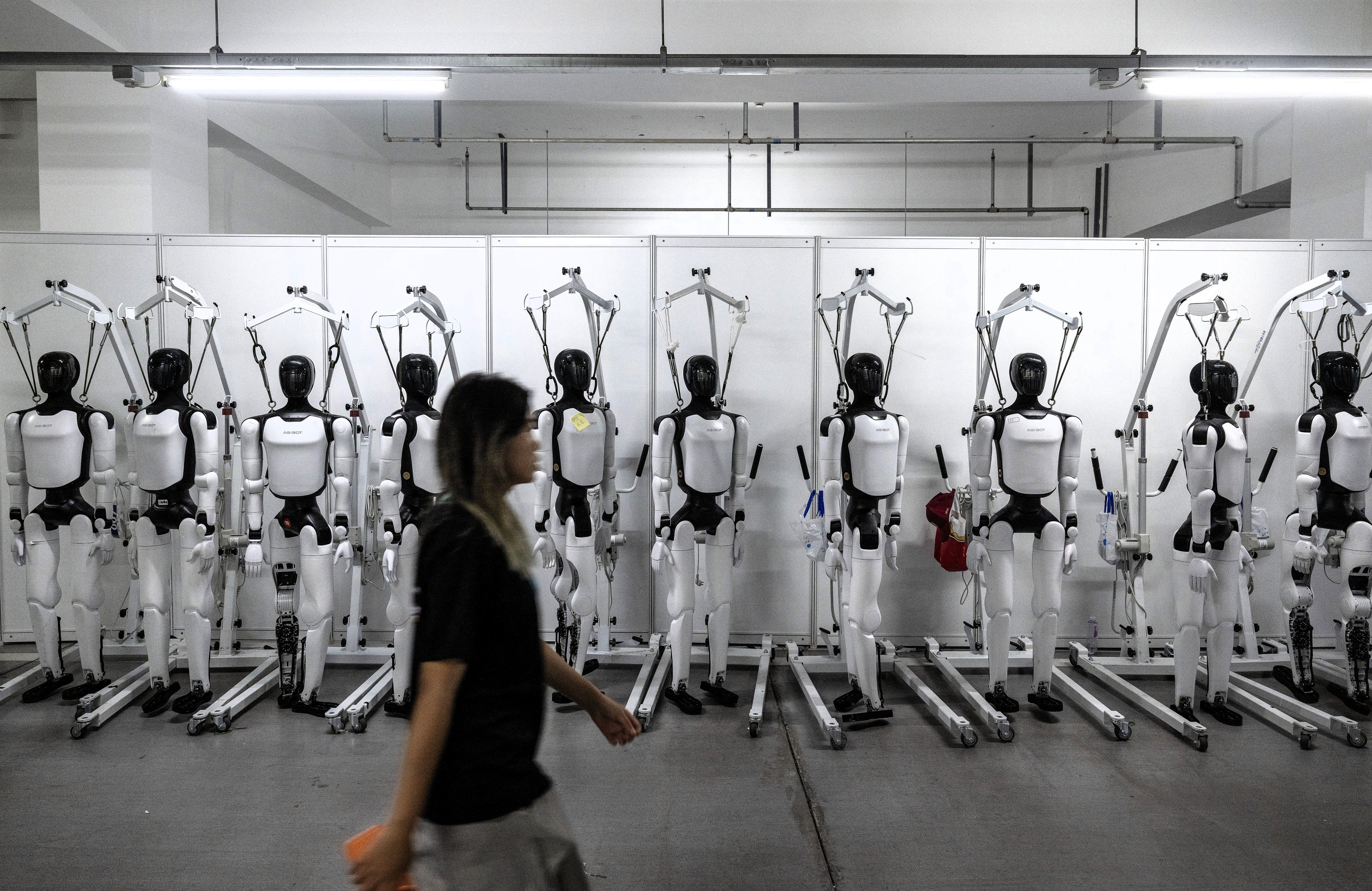 AI-powered humanoid robots at the 2nd World Robot Games at National Speed Skating Oval on 26 August, 2026 in Beijing, China (Kevin Frayer/Getty Images)