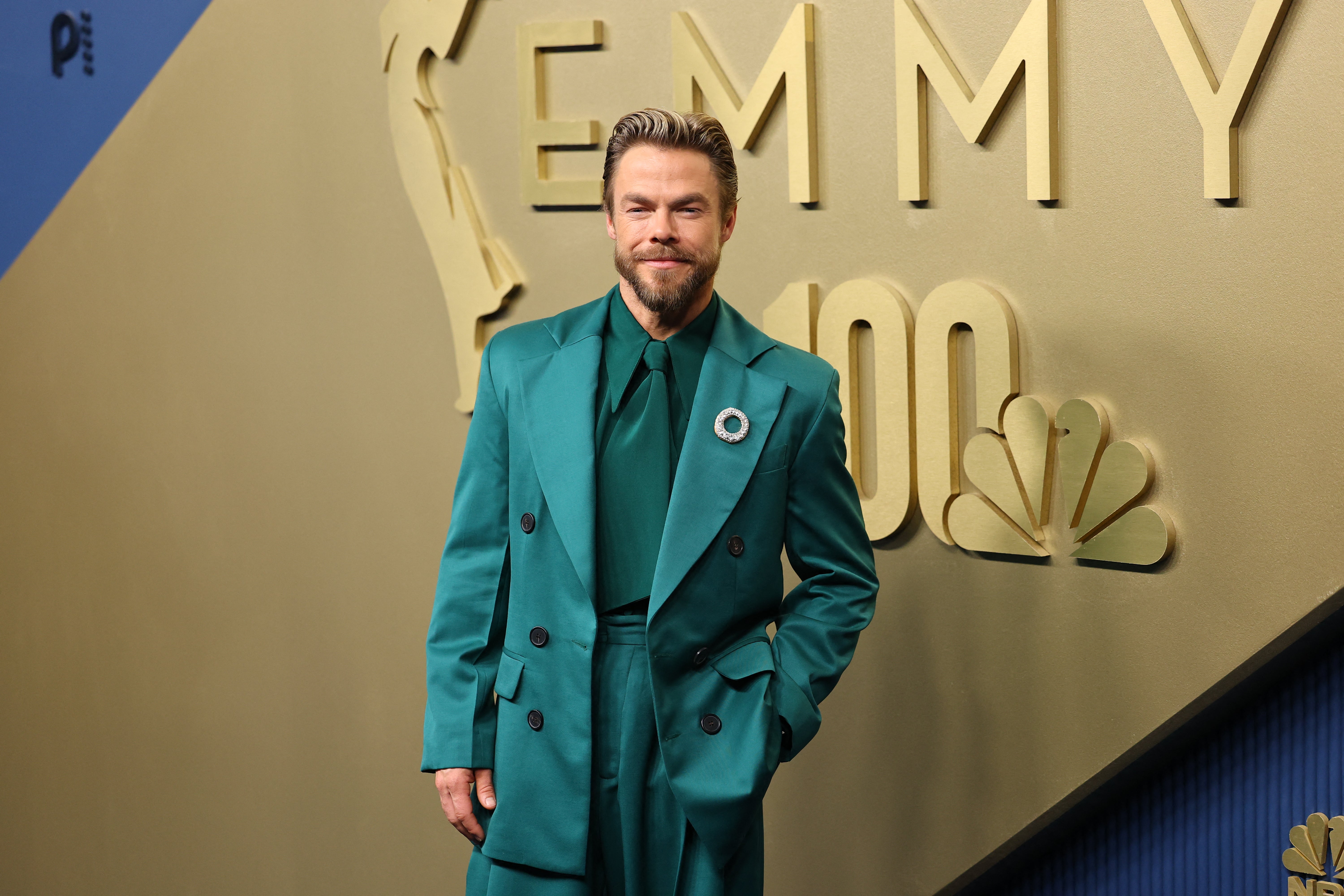 The brooch added a touch of sparkle to make Hough's fit pop even more than it already did thanks to the vibrant hue