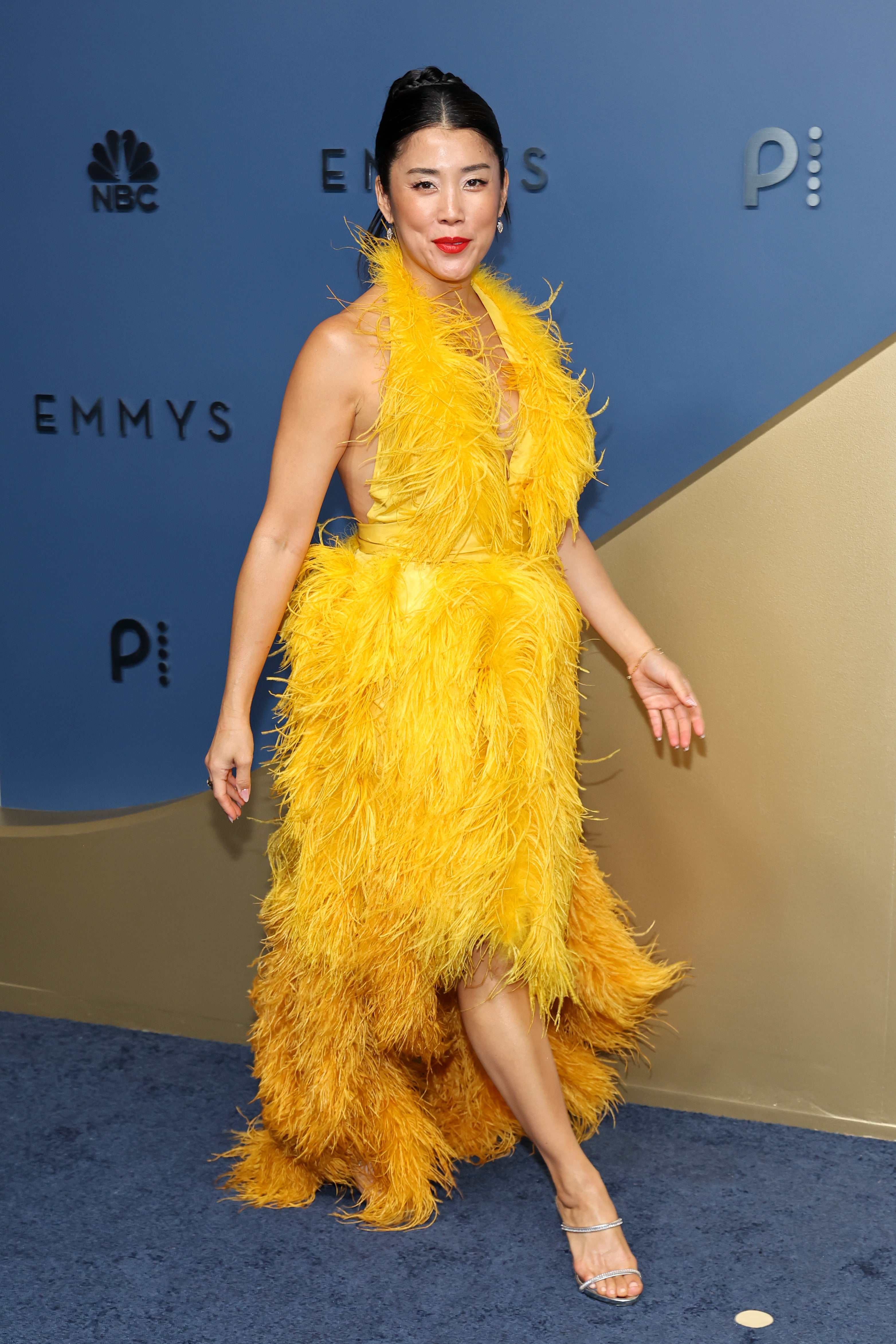 'Your Friends and Neighbors' star Eunice Bae arrived in a yellow feathered frock. It’s giving Big Bird from ‘Sesame Street’ — not 78th annual Emmy Awards
