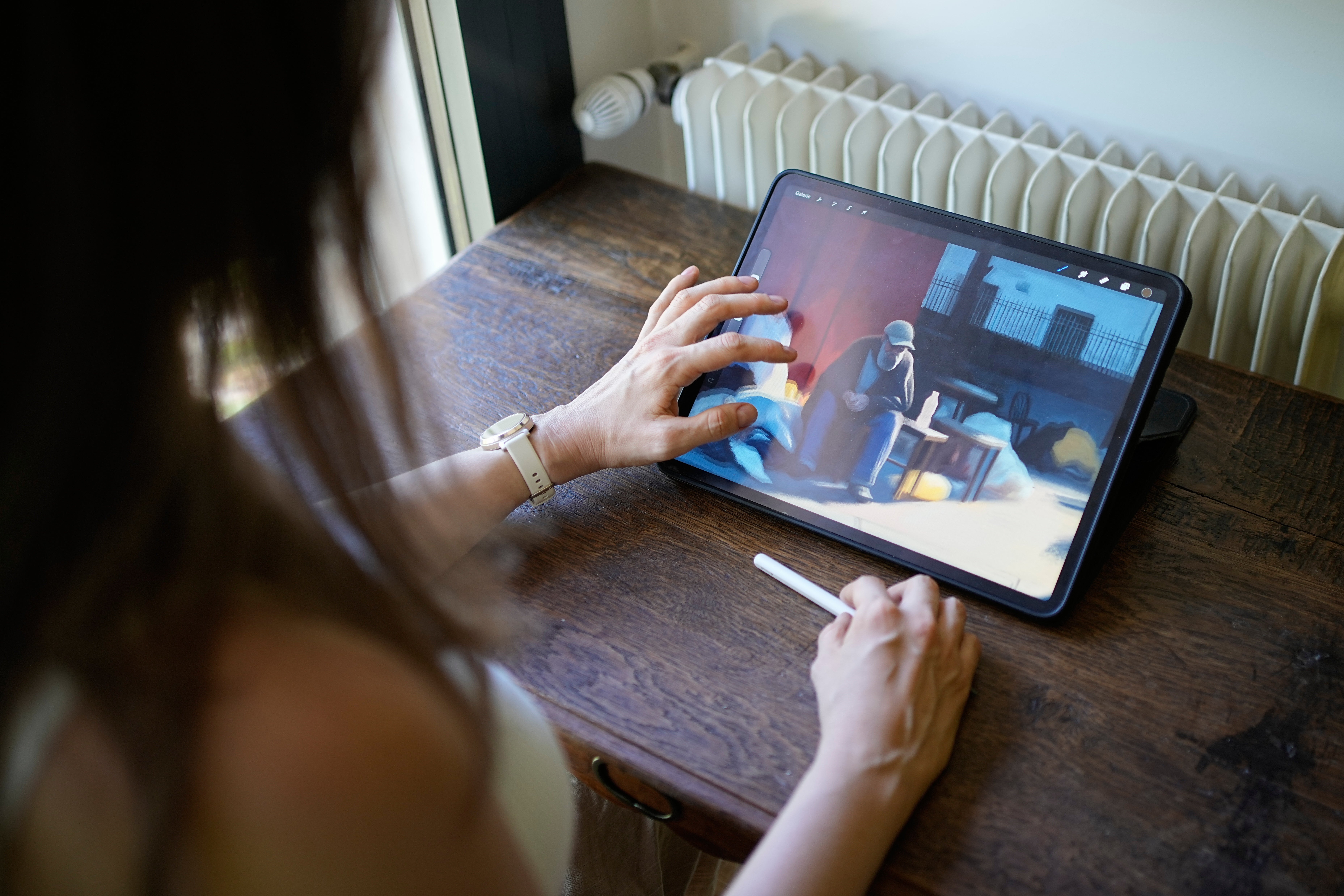 Illustrator Marina Antonova works on a drawing for her series called 