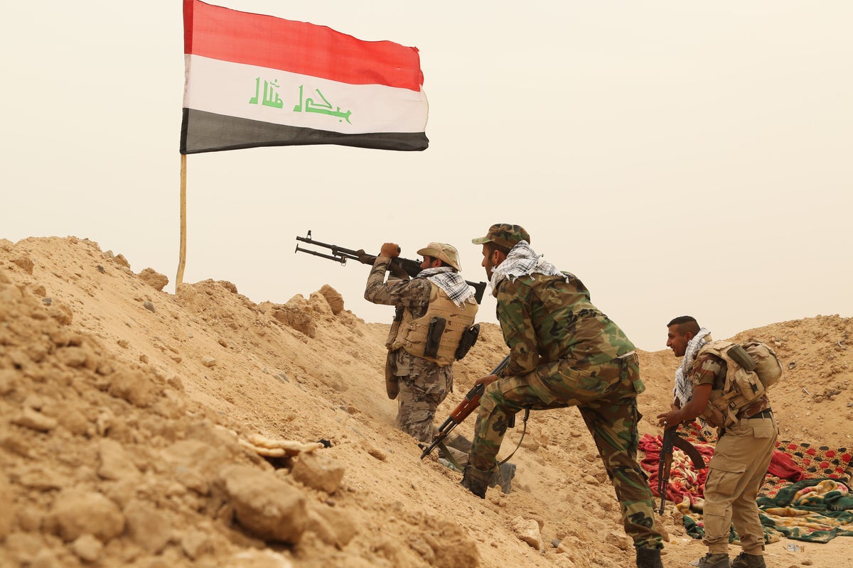 US Troops Exit Iraq, Militias Refuse to Disarm