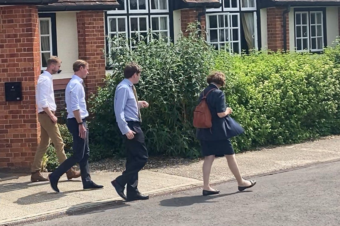 James Matthews (second left) leaving Kintbury Coronation Hall (PA)