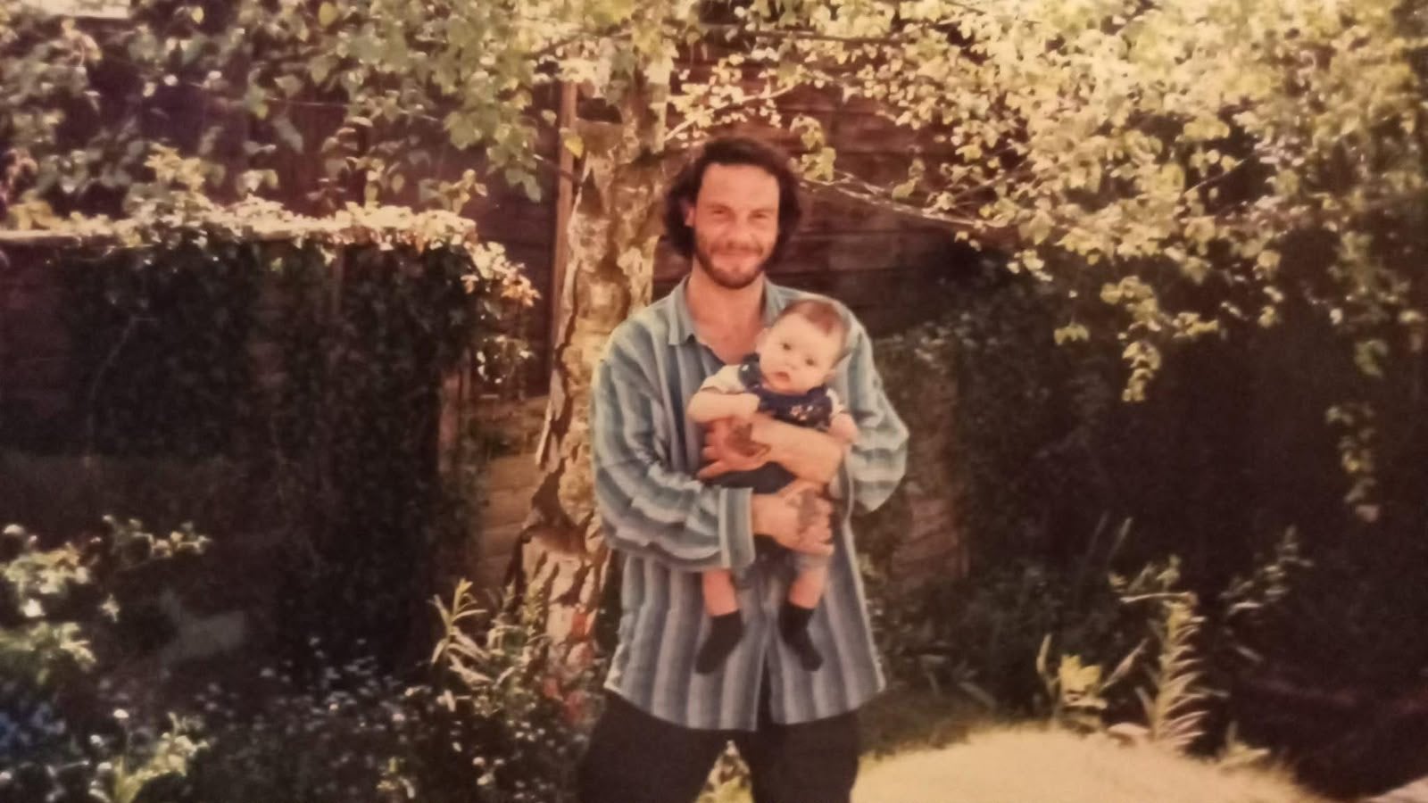 Mark Carroll with his youngest daughter Ayisha as a baby