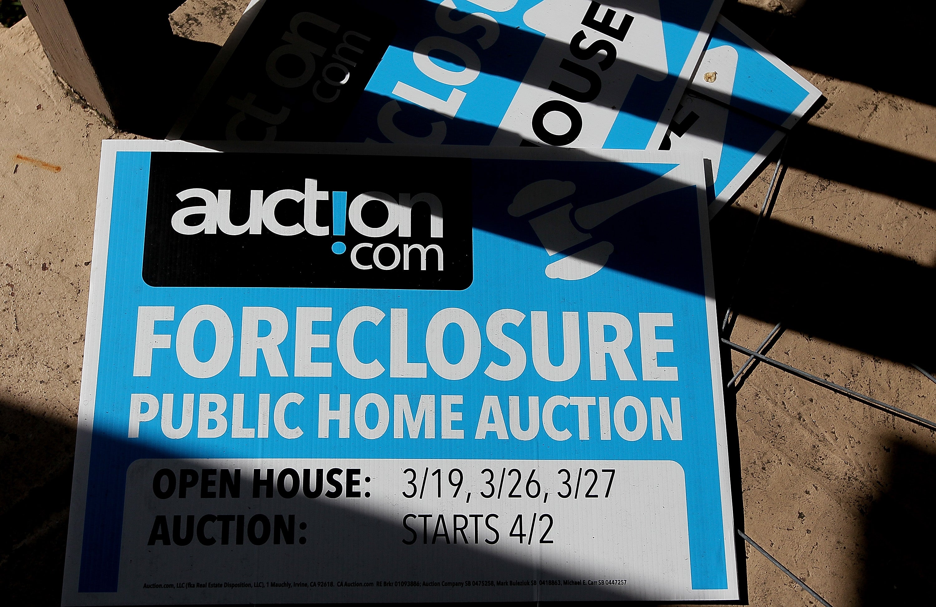 A home foreclosure sign. The couple are trying to raise enough money to try to keep their home