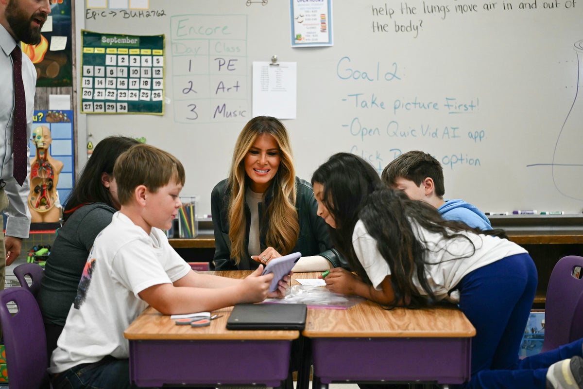 As AI debate flares, Melania Trump touts the technology as she tours North Carolina school
