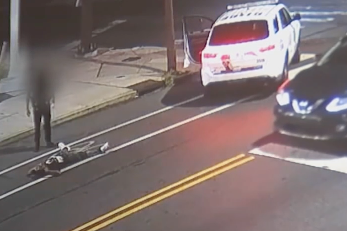 Cop used his foot to nudge man lying in street before driving off and leaving him to be hit by another car