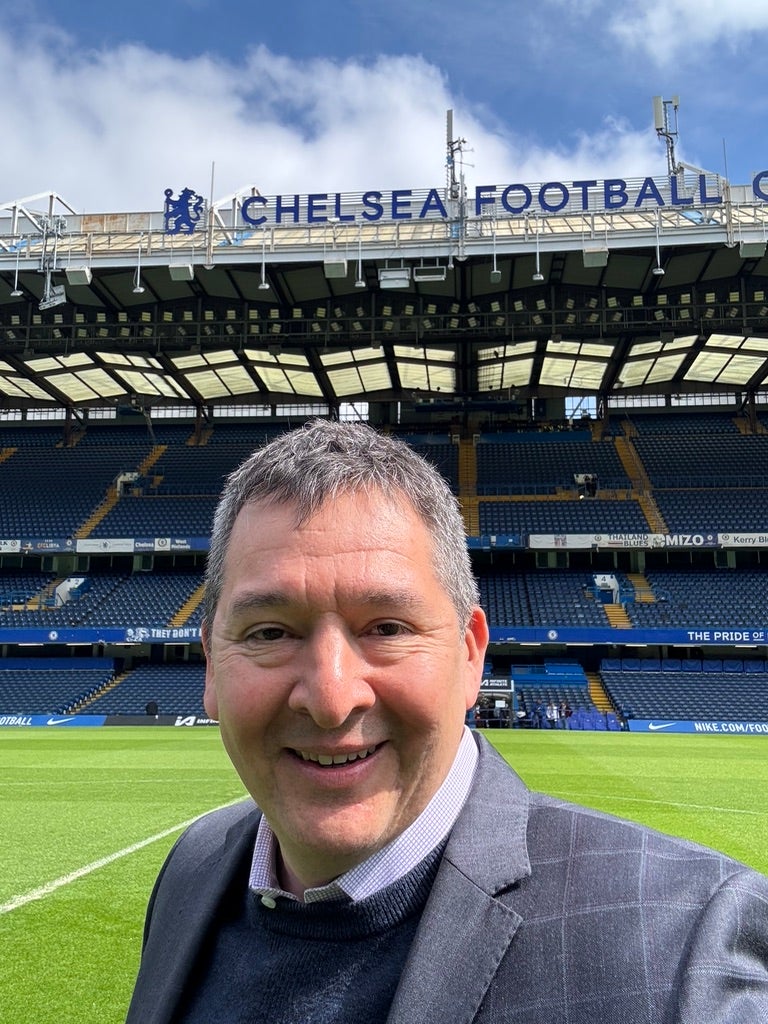Lares, pictured at Chelsea’s Stamford Bridge Stadium, moved from California to England in 2023 to become the club's CFO (Courtesy of Adriel Lares)
