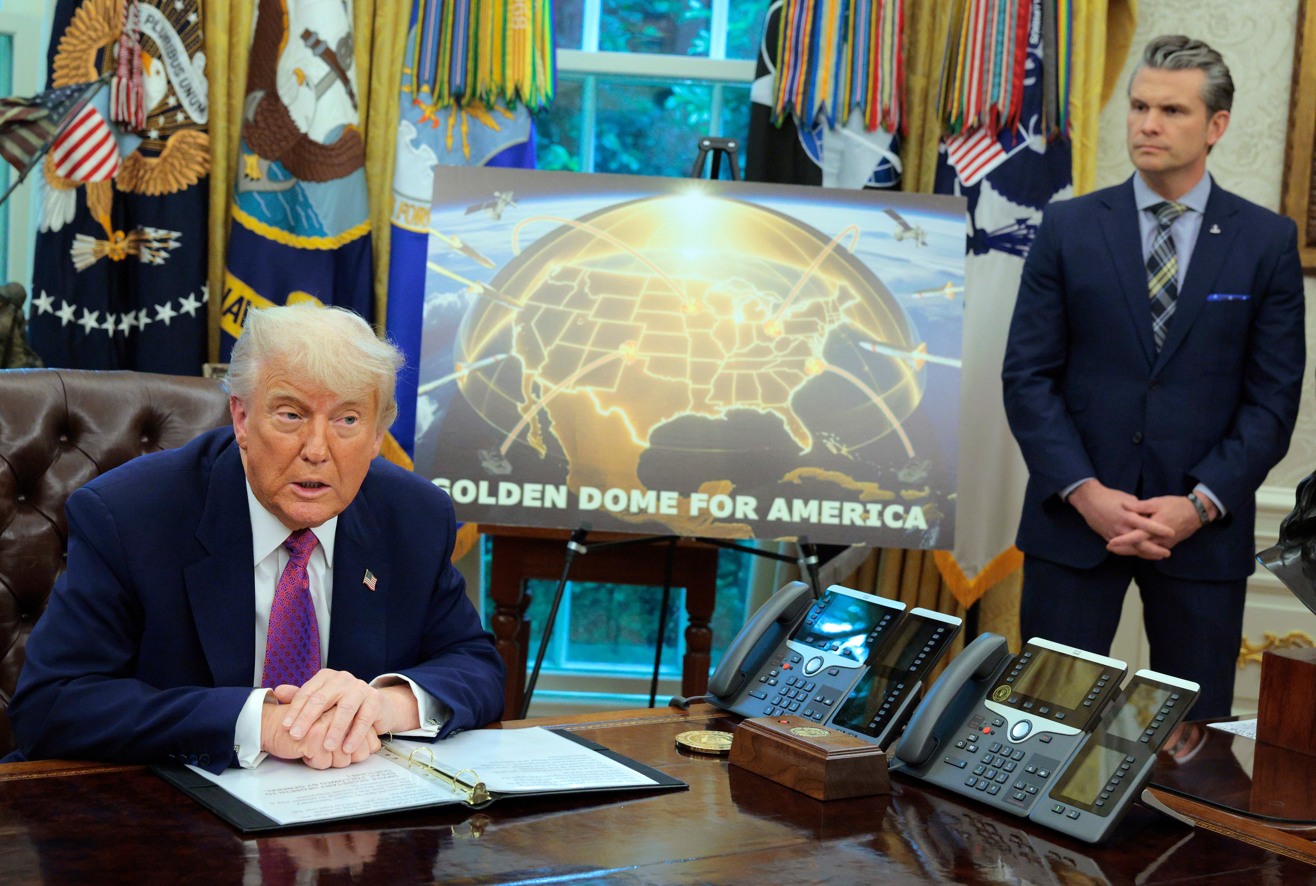 Donald Trump speaks alongside secretary of defence Pete Hegseth at the White House on 20 May 2025