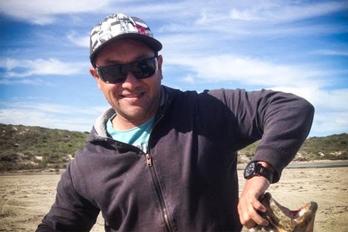 Shark attack victim faces long recovery after losing foot as rescuer is hailed as hero