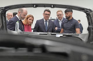 Jonathan Reynolds, Louise Haigh and Prime Minister Andy Burnham joined McLaren’s Nick Collins in Woking (Stefan Rousseau/PA)