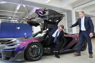 Mr Burnham sat inside a McLaren W1 supercar (Stefan Rousseau/PA)