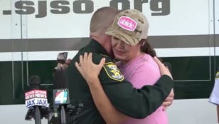 Image 13: Mother learns missing son found safe during live news conference