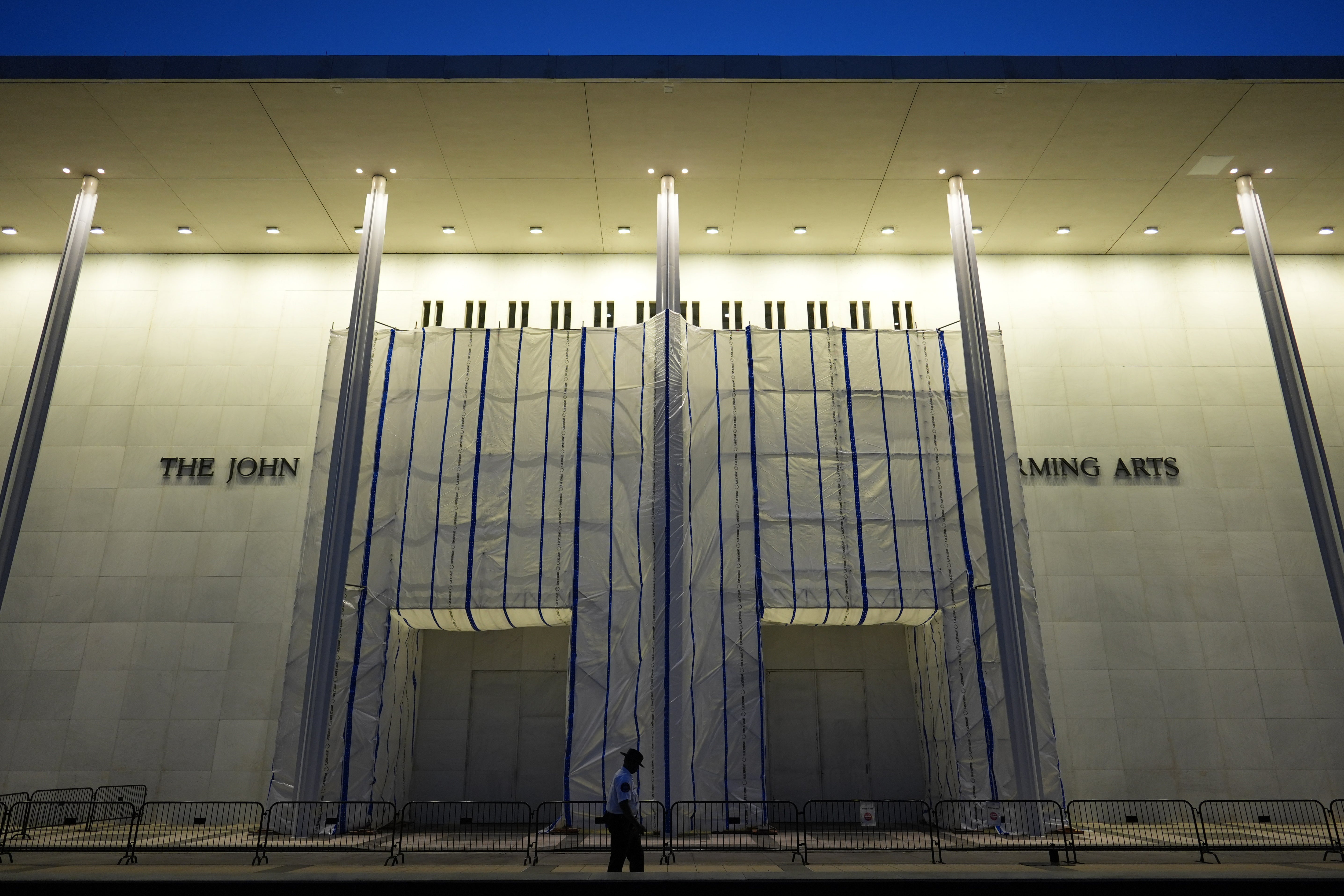 Scaffolding and tarp are still covering the Kennedy Center’s entrance after a judge previously ordered the venue to remove Trump’s name plates this summer