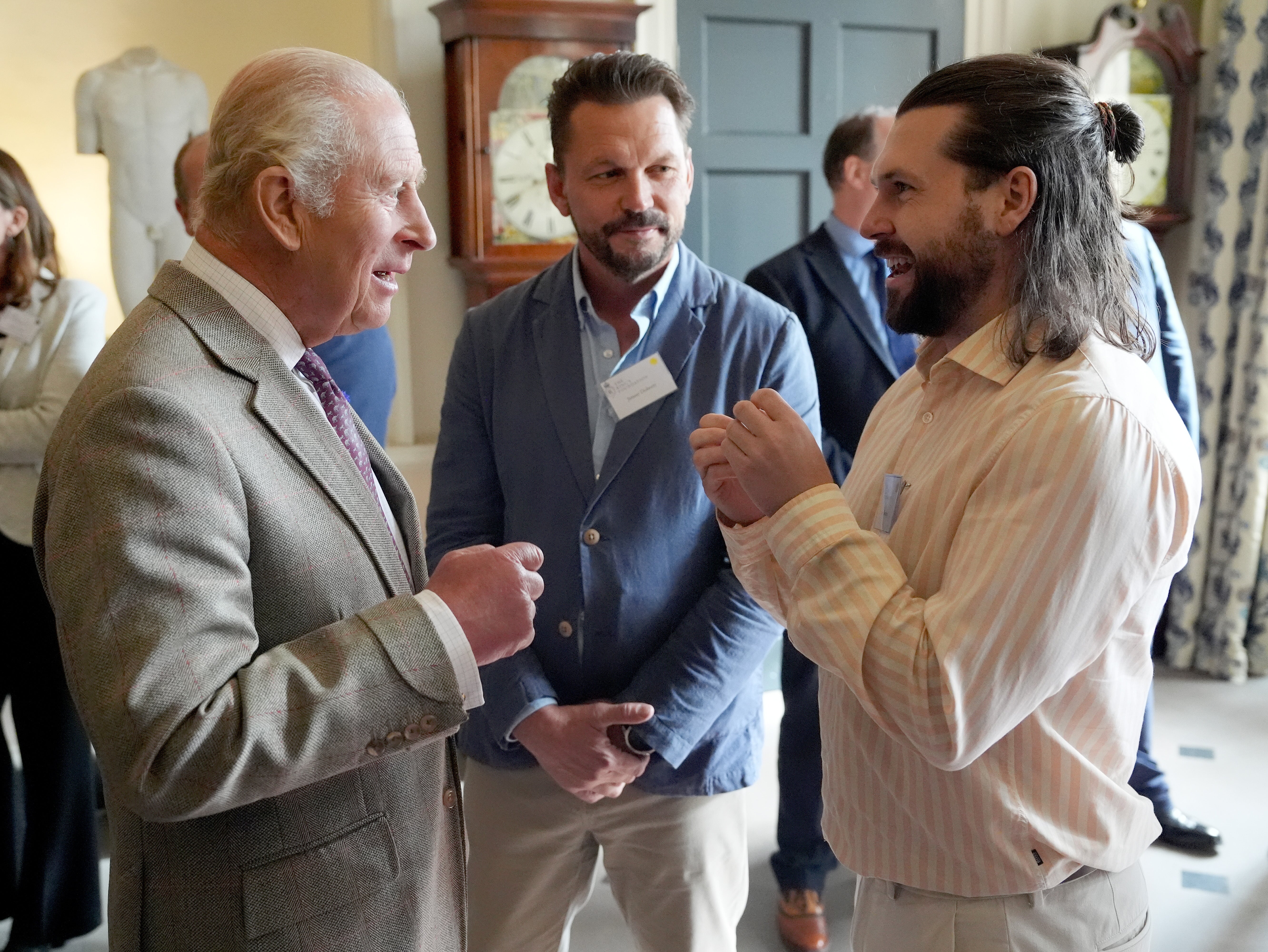 TV farmer Jimmy Doherty, centre, and content creator Sam Bentley, right, chatted with Charles during the reception (Jonathan Brady/PA) (PA Wire)