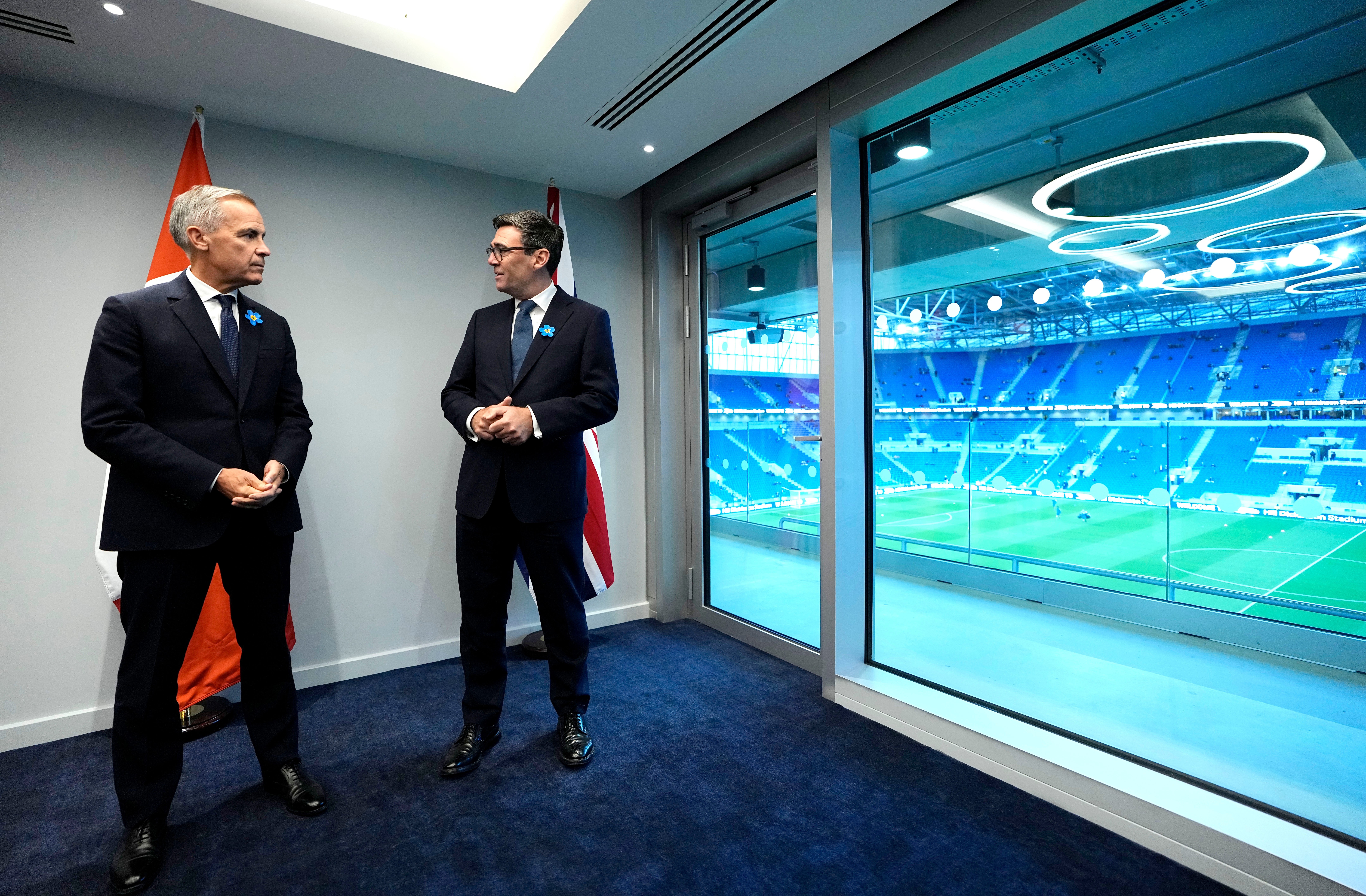 Burnham, right, and Carney speaking before kick-off