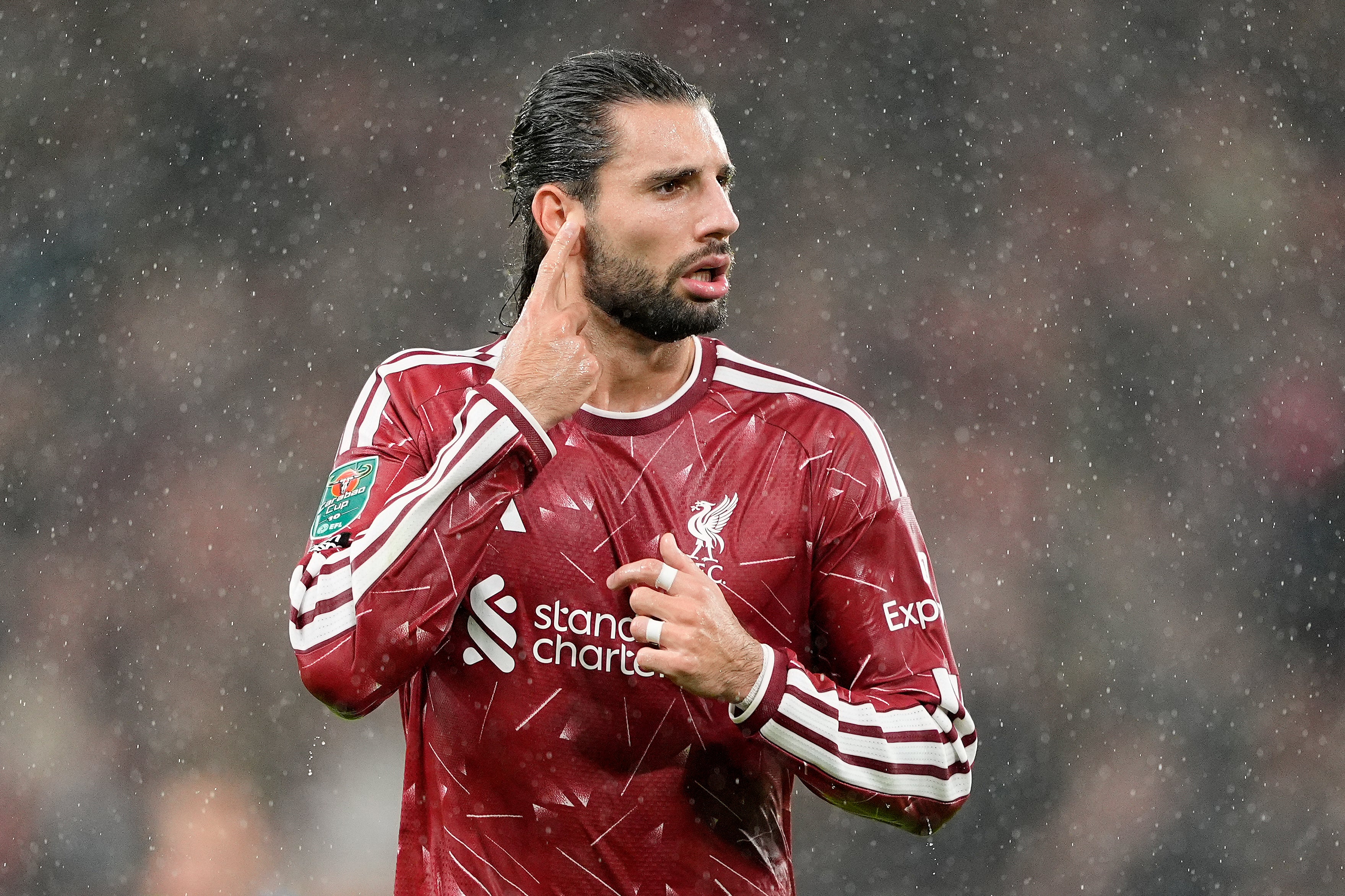 Szoboszlai pointed to his ear during his celebration of a goal against Spurs