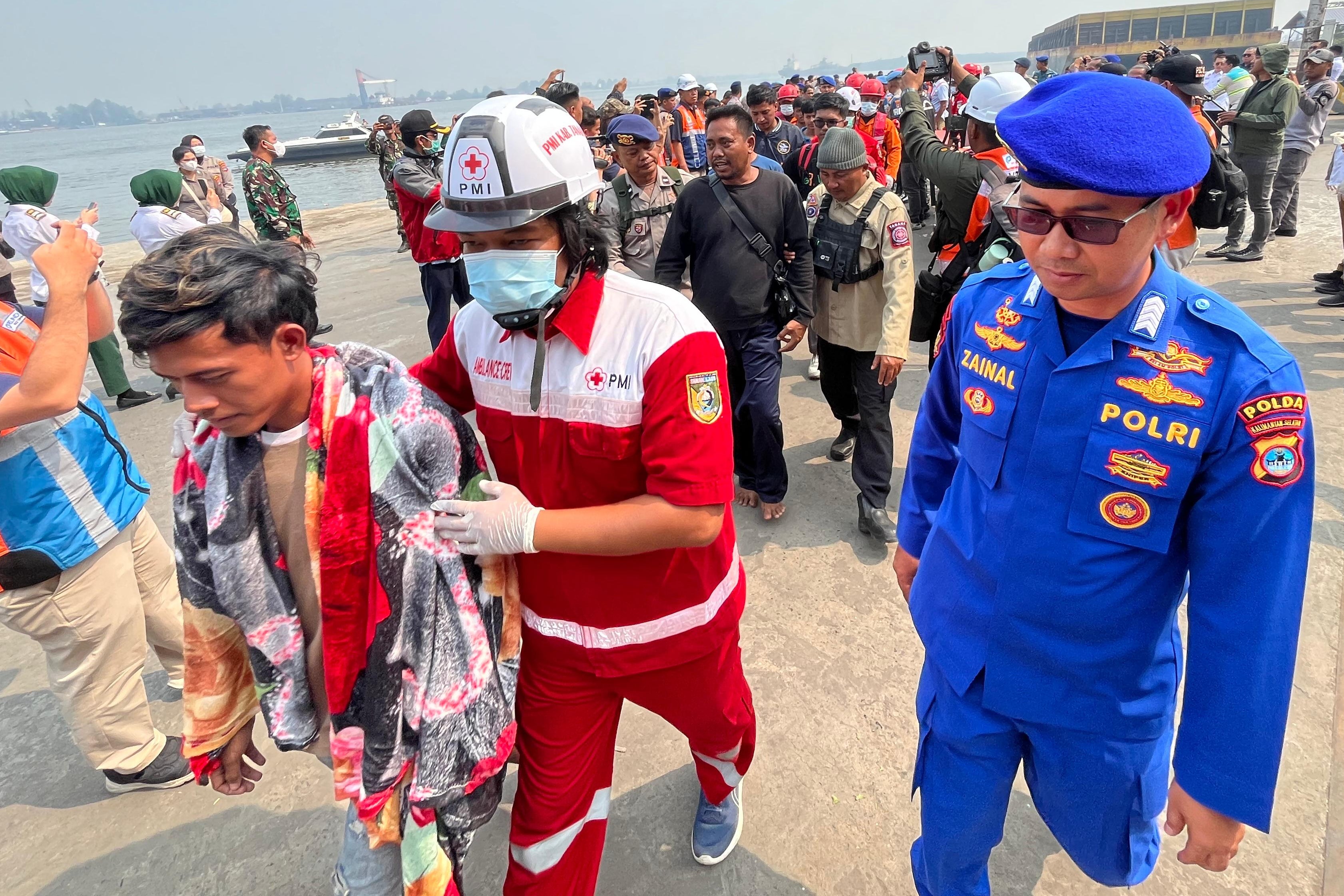 Indonesia Prepares to Right Capsized Ferry After 129 Missing