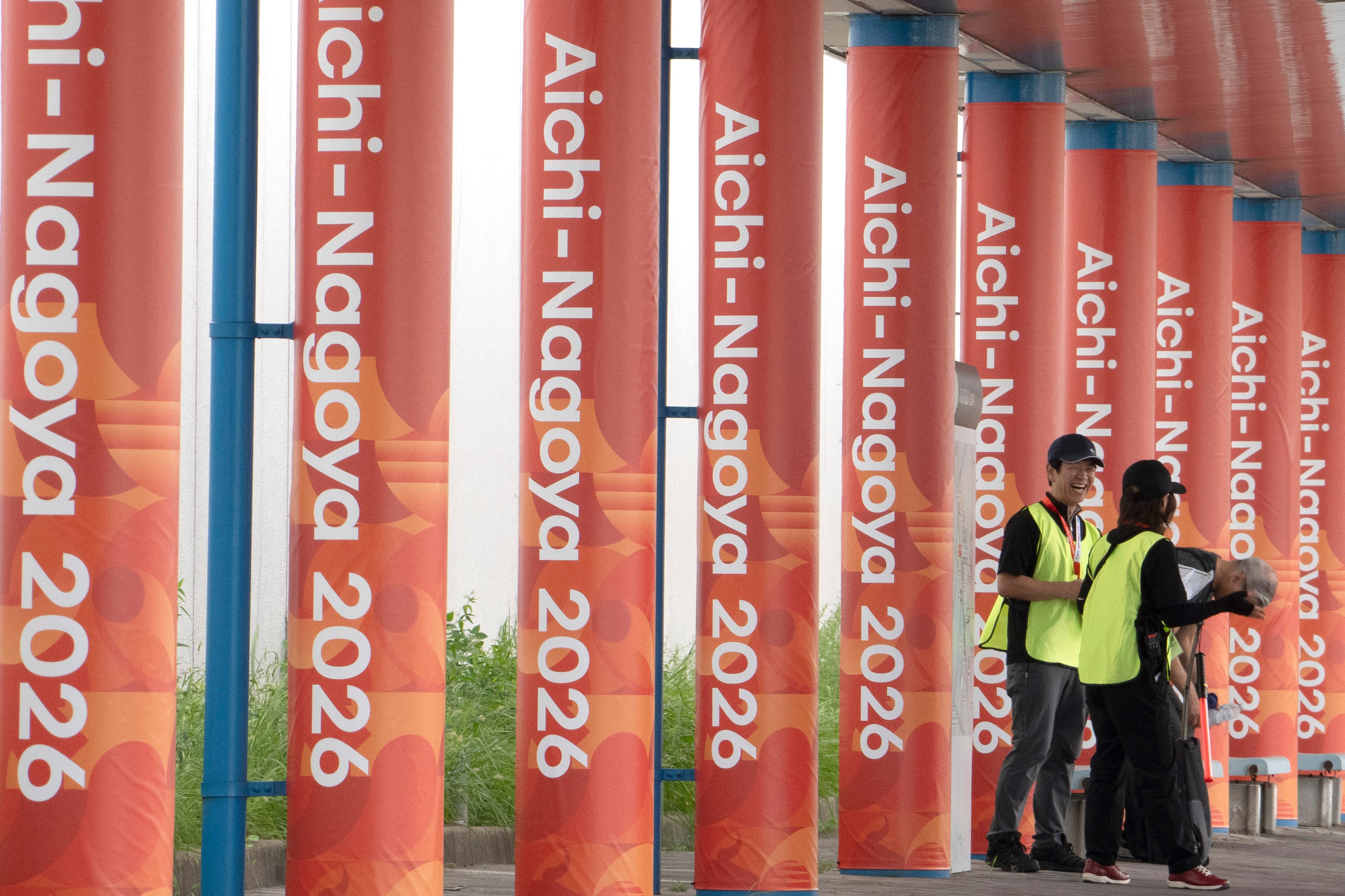 People stand near the main media centre ahead of the 20th Asian Games Aichi-Nagoya on 17 September 2026 in Nagoya, Aichi, Japan