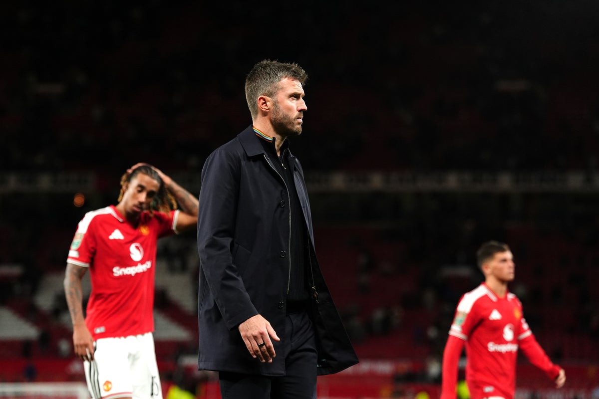 Michael Carrick looking concerned on the Old Trafford touchline during Manchester United's Carabao Cup defeat against Brighton