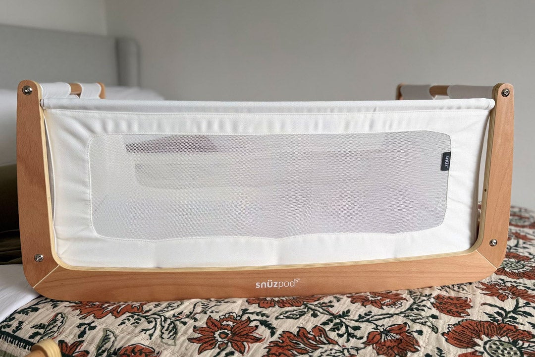 The bassinet can be removed from the frame, making it easy to move around the home (Sarah Jones/The Independent)