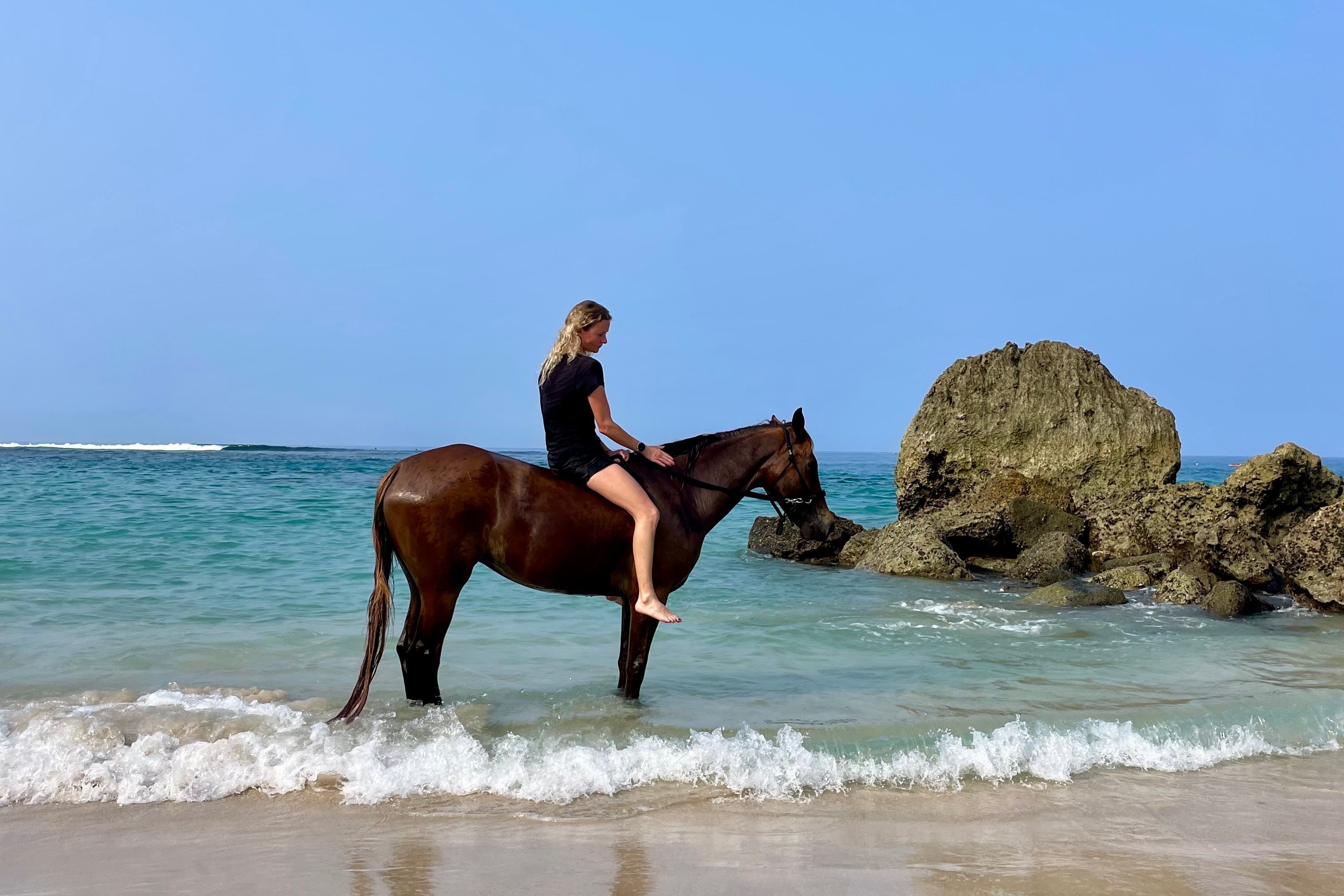 Global travel editor Annabel Grossman on horseback at Nihi Sumba in Indonesia (Annabel Grossman)