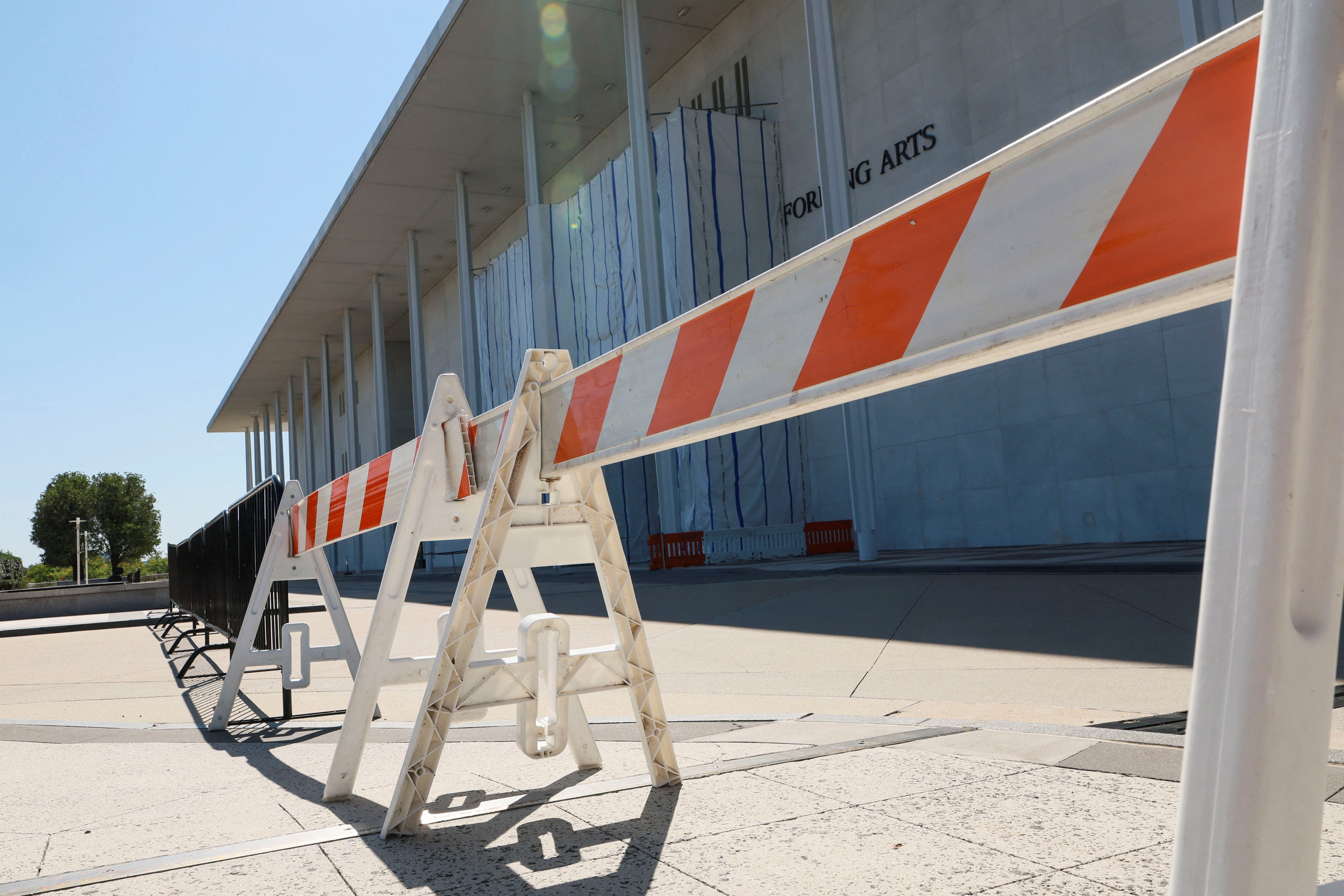 Workers installed fencing and barricades around the Kennedy Center on September 16 after the board voted to shutter the institution (Reuters)
