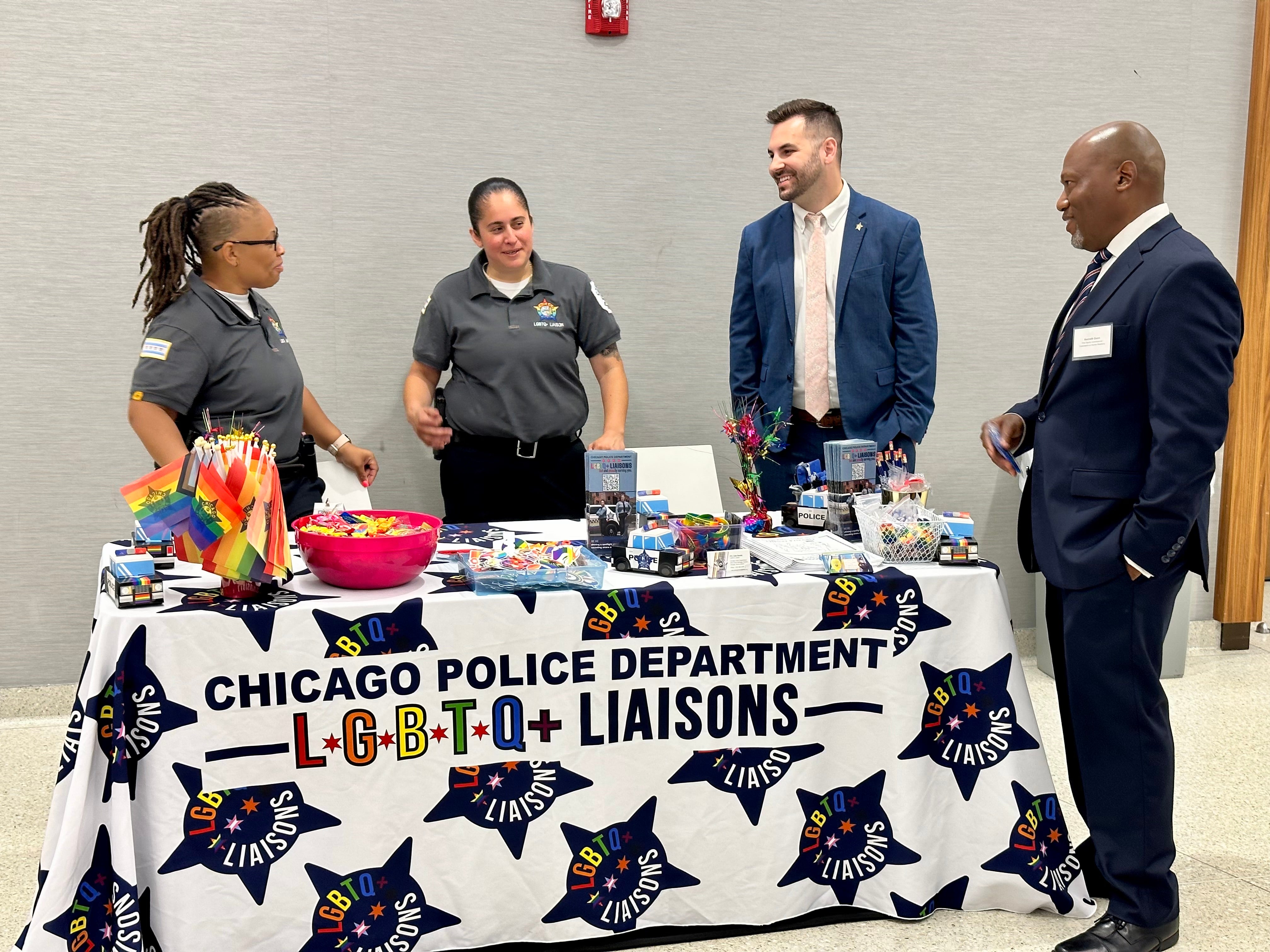 Mike Milstein, a high-level civilian Chicago police employee, accuses the city of chilling his First Amendment rights. Milstein (second from right) made social media posts about the ‘No Kings’ protest (Chicago Police Department)
