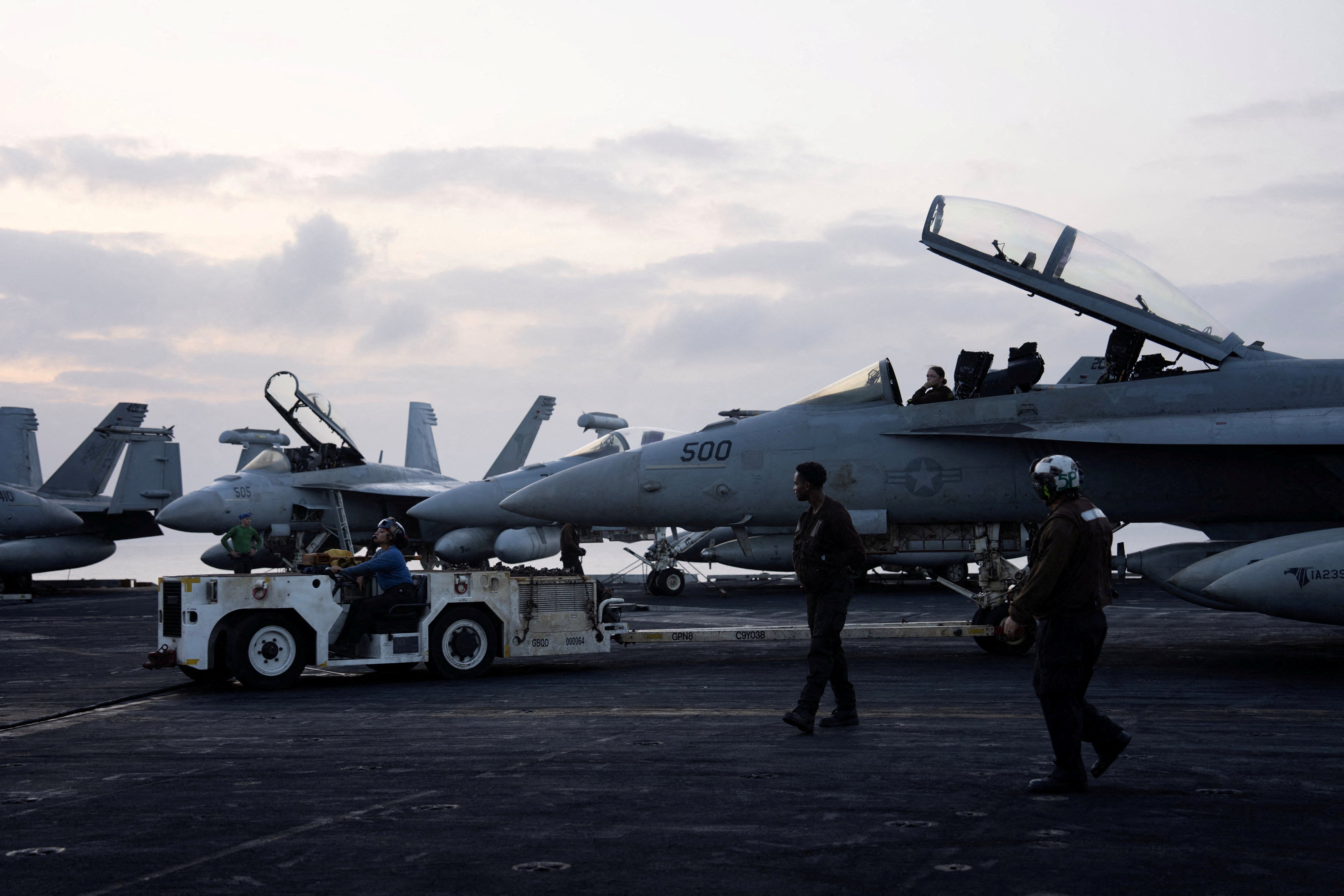 A fighter jet sits on the flight deck of the USS George Washington in the Arabian Sea, September 11, 2026. The aircraft carrier, capable of carrying more than 5,000 personnel, is enforcing a U.S. naval blockade against Iran and providing cover for commercial vessels transiting the Strait of Hormuz