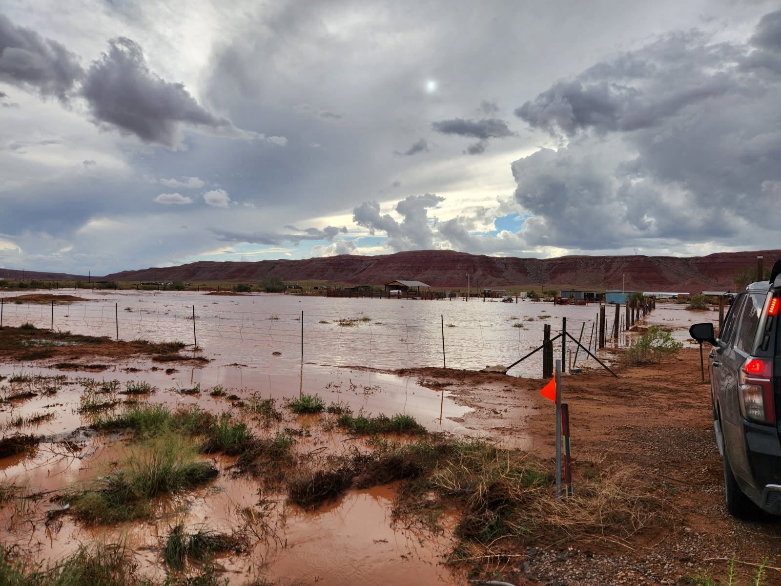 Flood waters soak the ground in Chinle, Arizona, on the Navajo Nation, after heavy rains September 15. Three people, including one child, were killed in the floods early on Wednesday morning near the Newcomb community in northwestern New Mexico