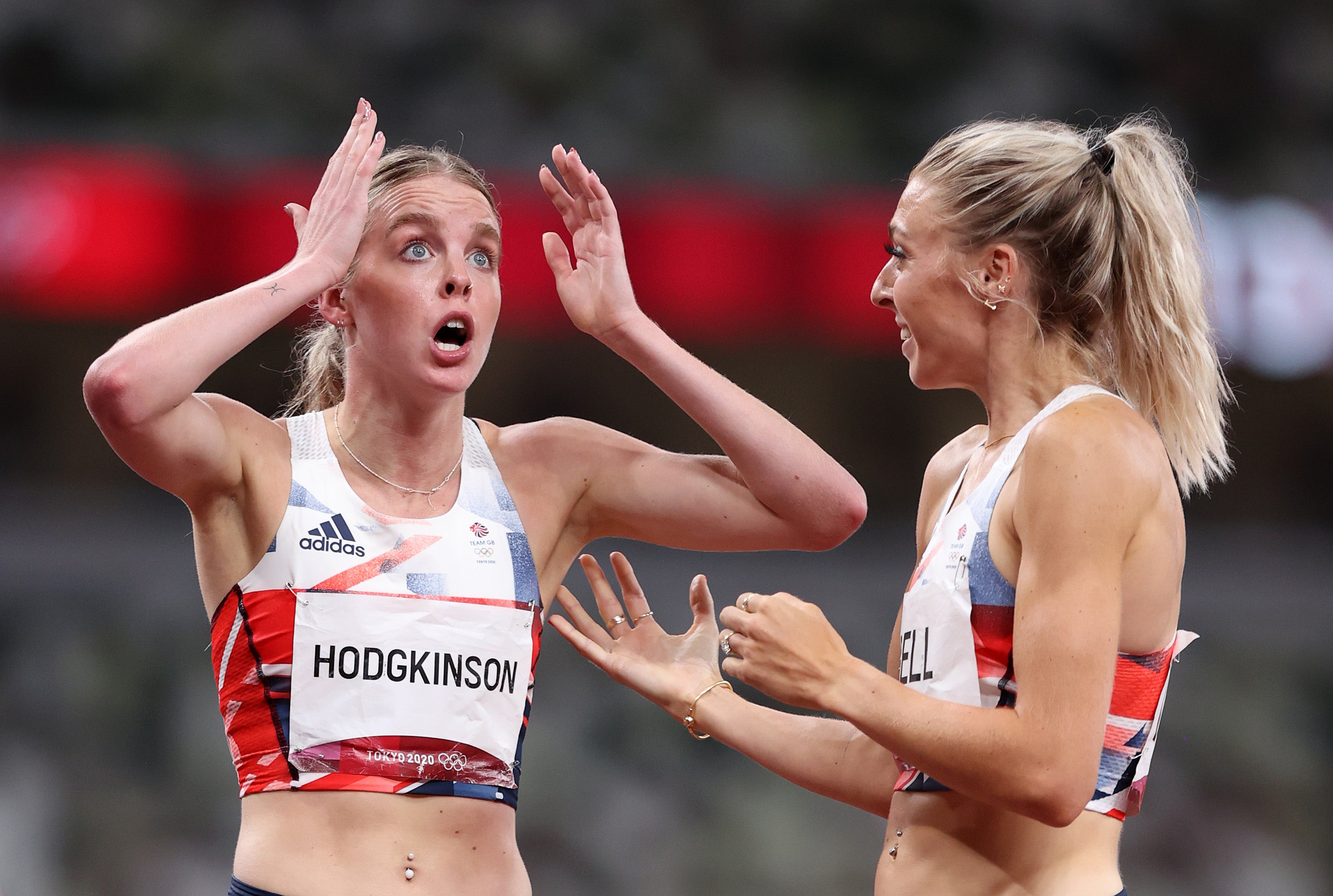 Alex Bell reacts after Keely Hodgkinson won silver at the Tokyo Games