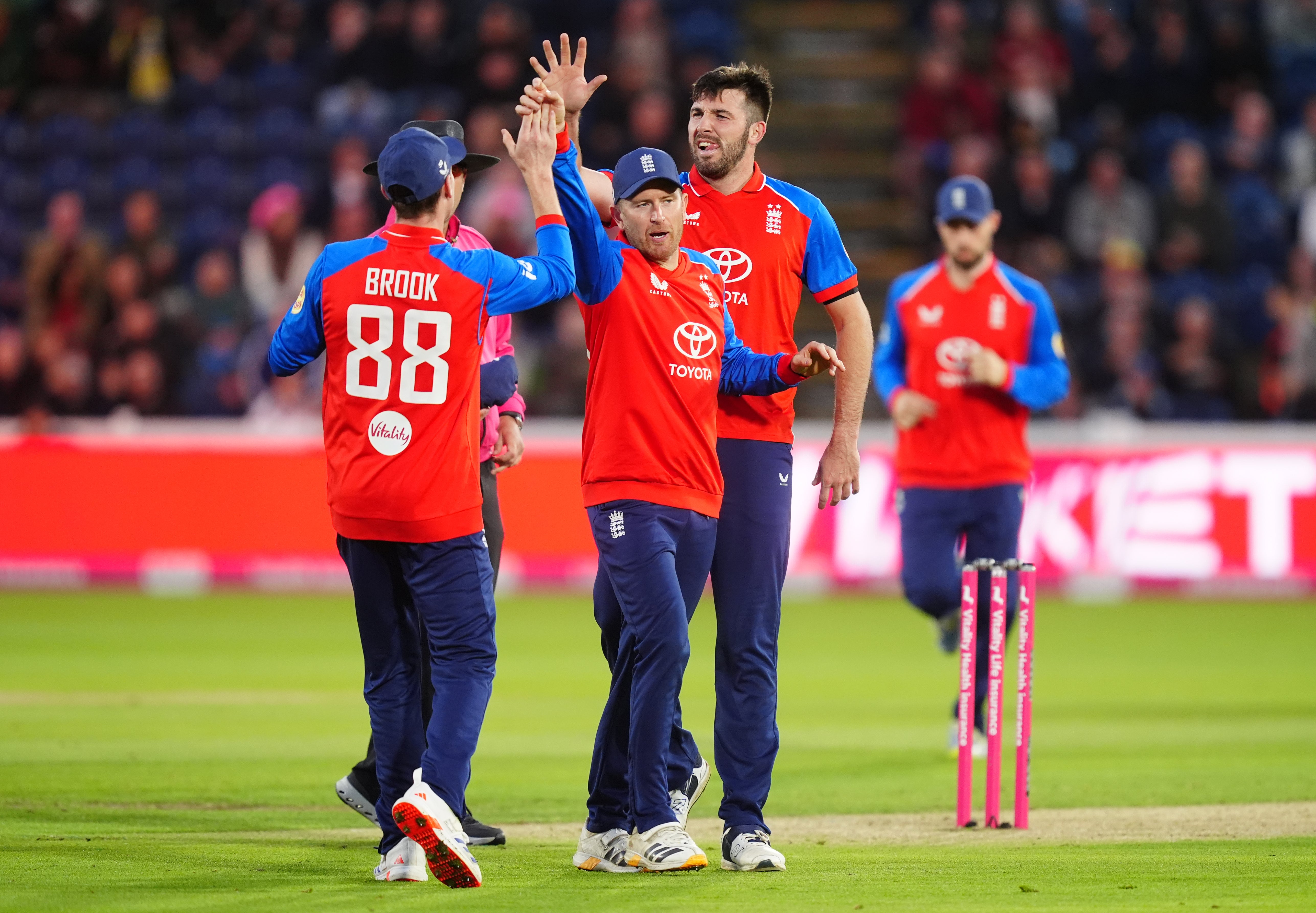 High fives all round as Jamie Overton (right) celebrates with Liam Dawson (centre) and Harry Brook after taking the wicket of Sri Lanka’s Pathum Nissanka in Cardiff (David Davies/PA)