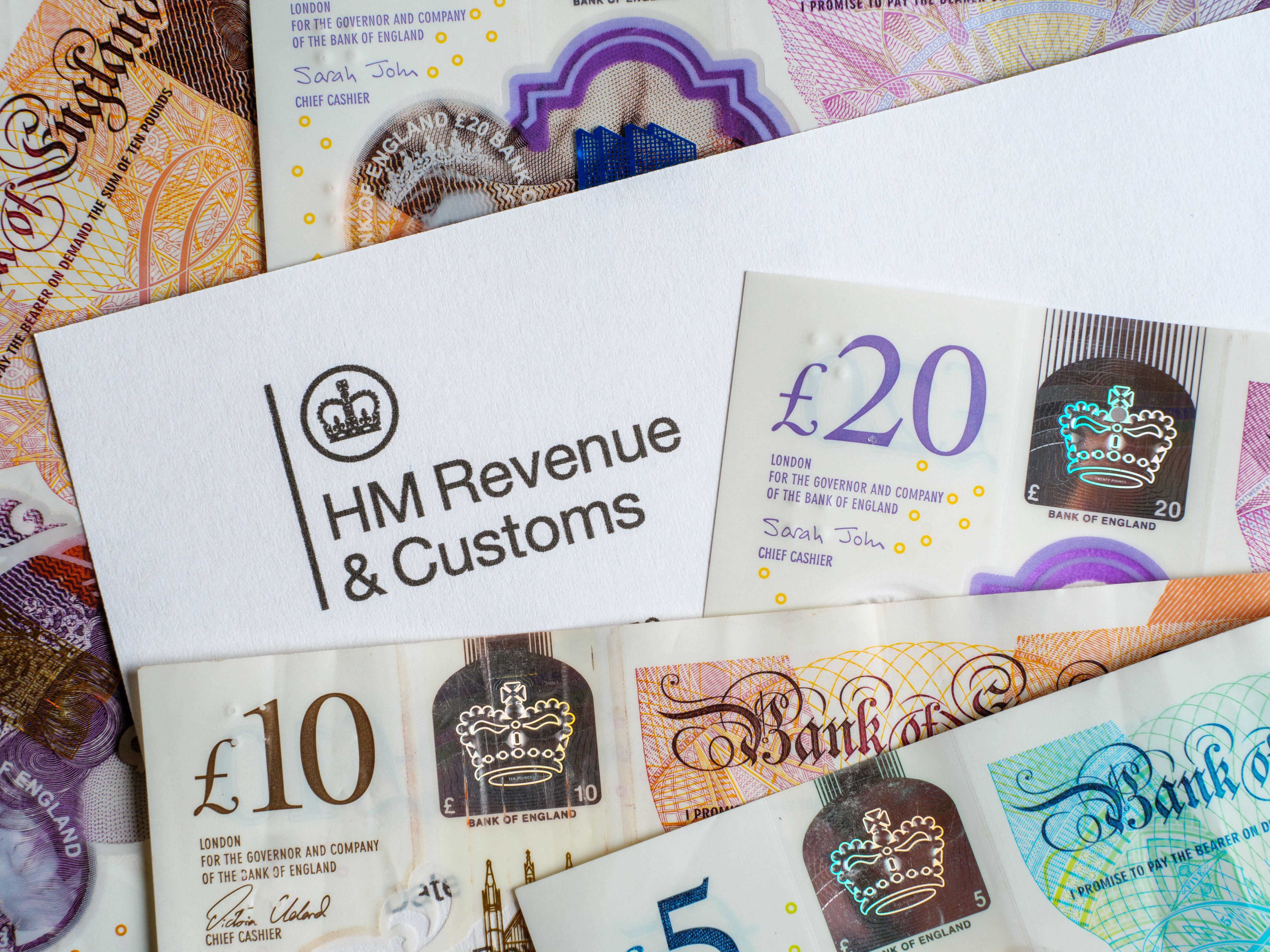 Earning over £1,000 from a side hustle means you must report it to HMRC and potentially pay Income Tax (Alamy/PA)