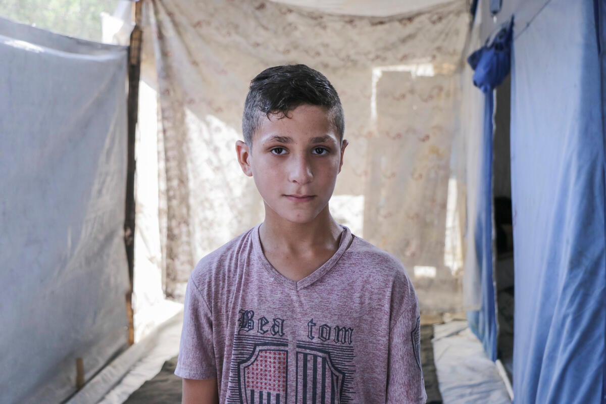 Khaleel, 10, was seriously injured by an explosive remnant of war while playing football near a school in Gaza. He suffered multiple shrapnel injuries to his face, eyes and ear, leaving him with severe vision impairment.