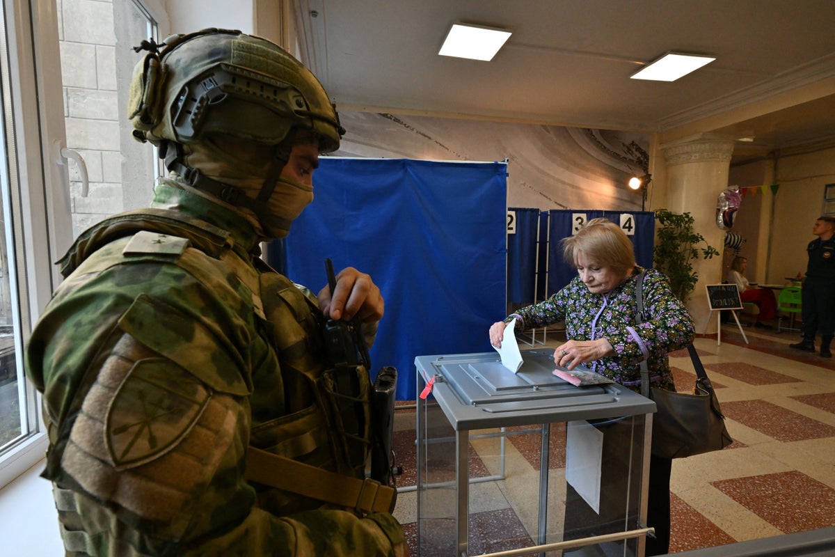 Ukraine lashes out at Russian elections ‘held at gunpoint’ in occupied territory